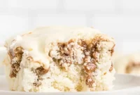 Irresistible Cinnamon Roll Poke Cake