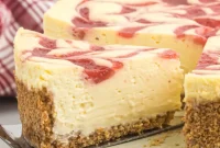 Velvet Strawberry Swirl Cheesecake
