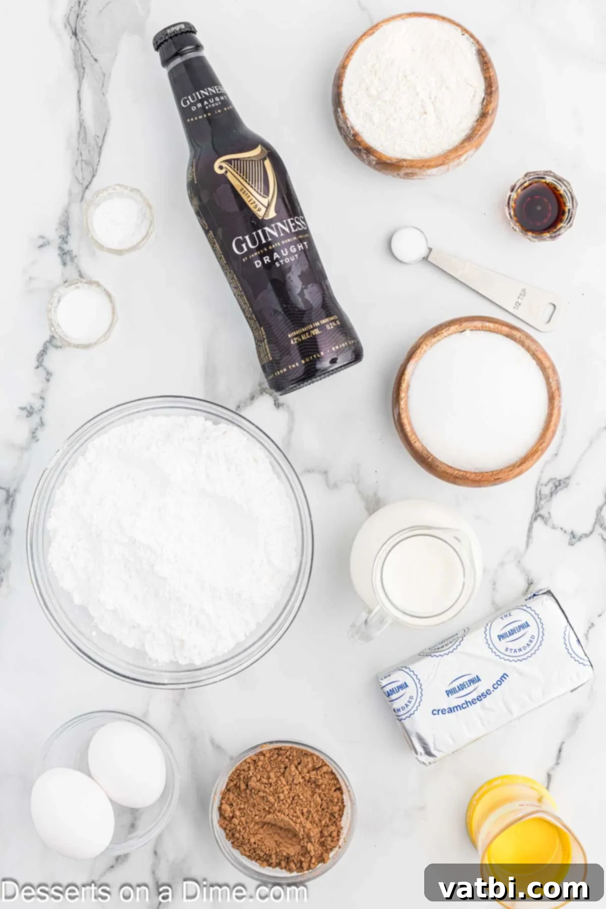 Ingredients for Guinness Cake - eggs, vanilla, cocoa powder, baking soda, baking powder, flour, Guinness beer. 