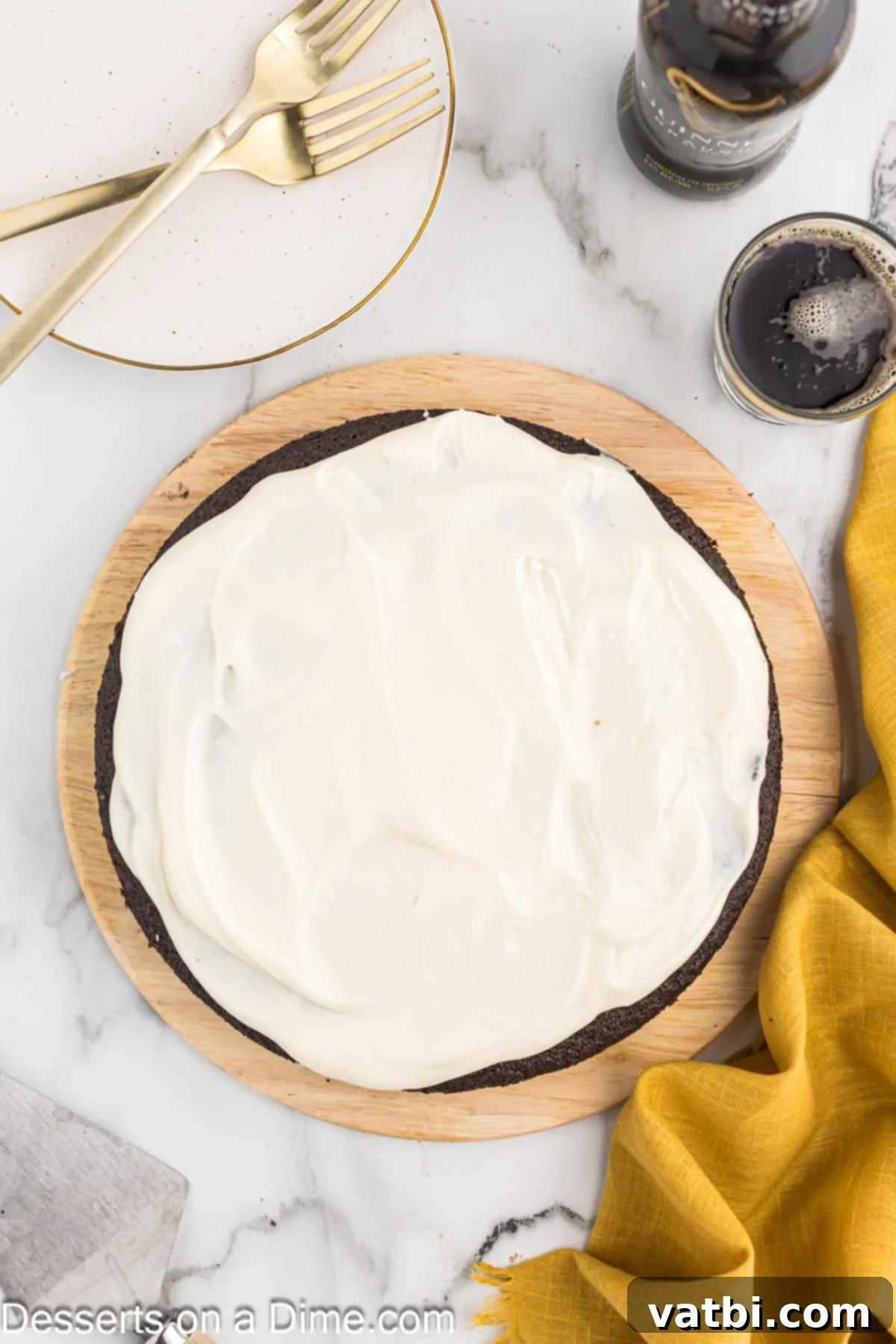 Frosting spread on cake. 