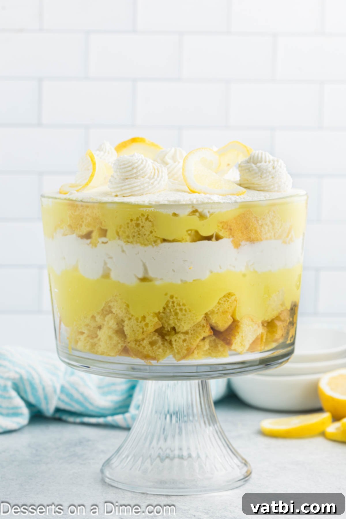 Zesty Lemon Layers 10 Lemon trifle beautifully layered in a dish, ready for chilling.