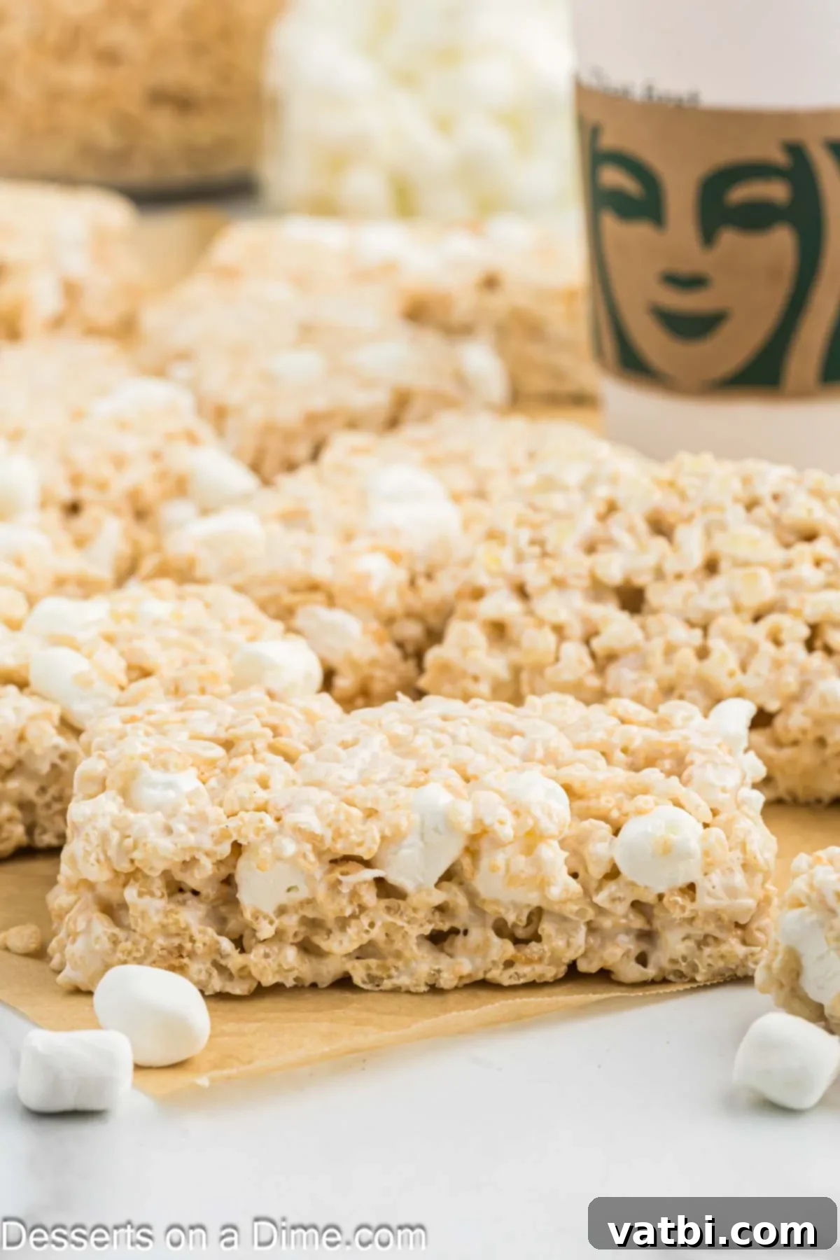 Starbucks Marshmallow Cloud Bar 2 Starbucks marshmallow dream bar cut into bars, showcasing their gooey texture.