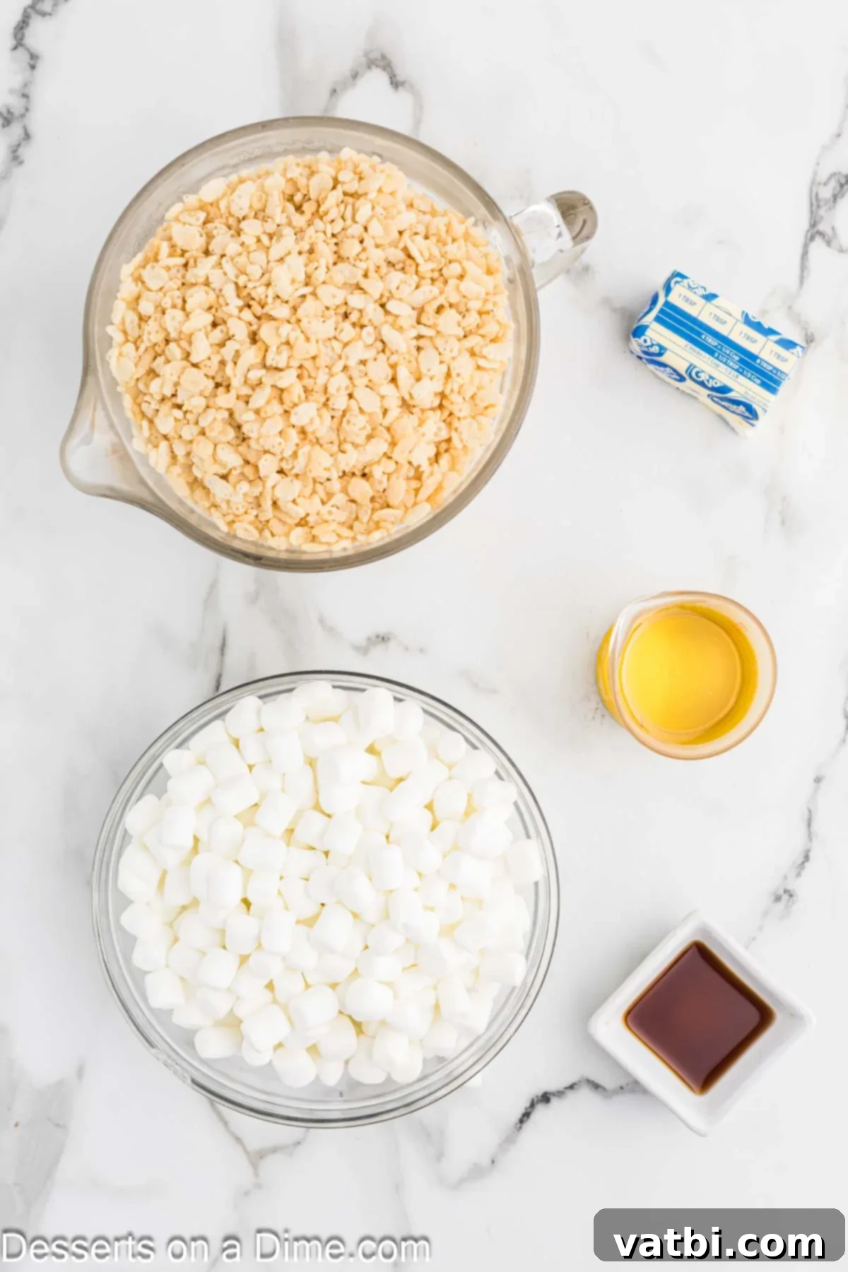 Starbucks Marshmallow Cloud Bar 3 All the essential ingredients for Starbucks Marshmallow Dream Bars laid out: corn syrup, unsalted butter, Rice Krispies cereal, mini marshmallows, and vanilla extract.