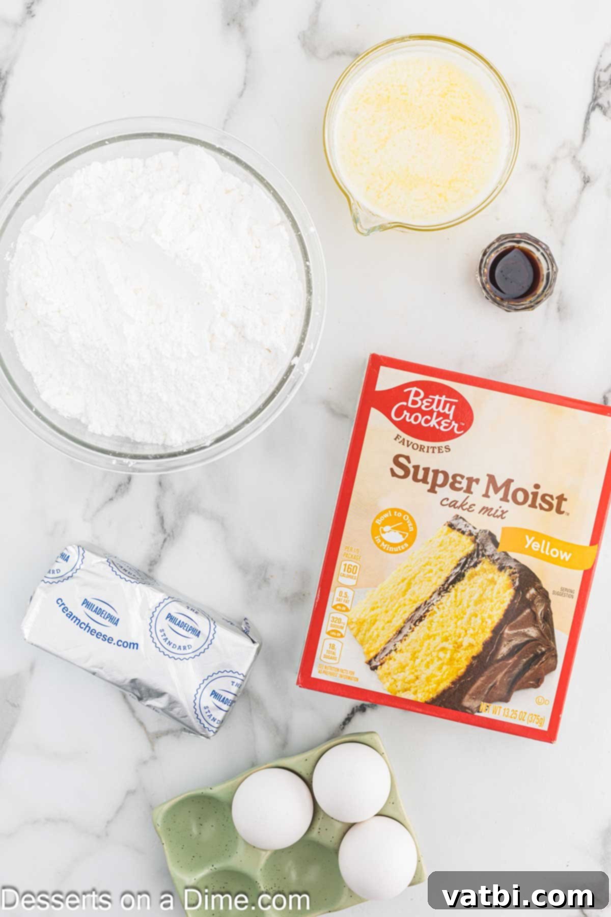 Paula Deen's Signature Ooey Gooey Butter Cake 3 Ingredients for Ooey Gooey Butter Cake showing a box of yellow cake mix, an egg, and a stick of butter.