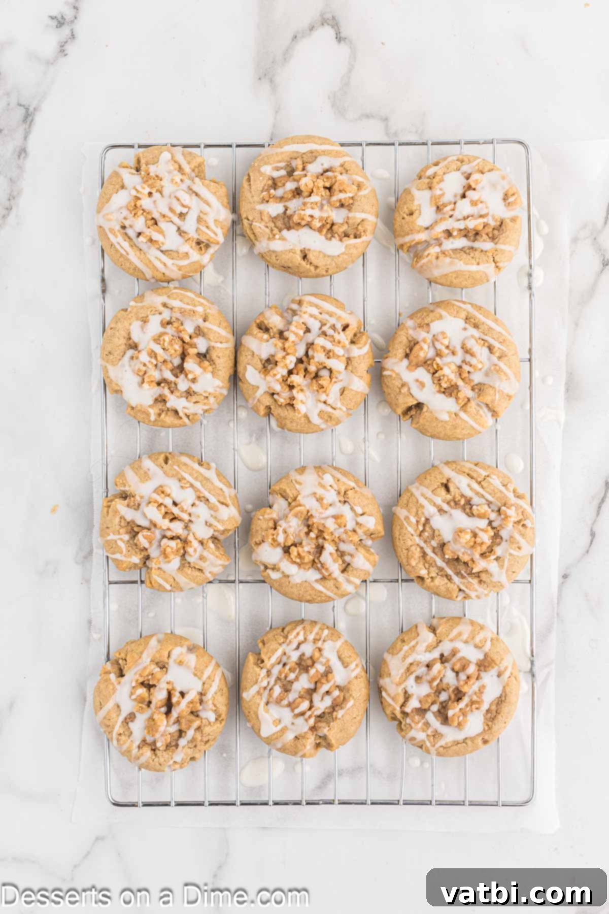 Cinnamon Streusel Cookies 11 Cookies on wire cooling rack topped with glaze.