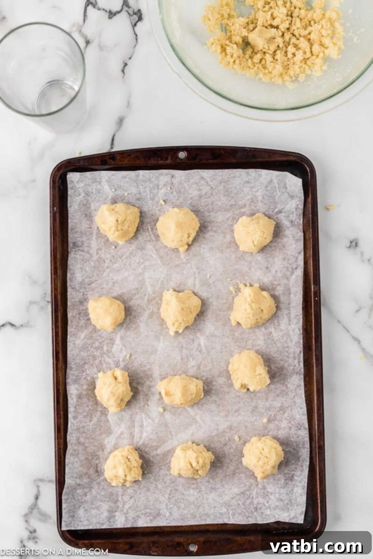 Buttery Gluten-Free Shortbread Bliss 6 Cookie dough scooped into balls and placed on baking sheet.