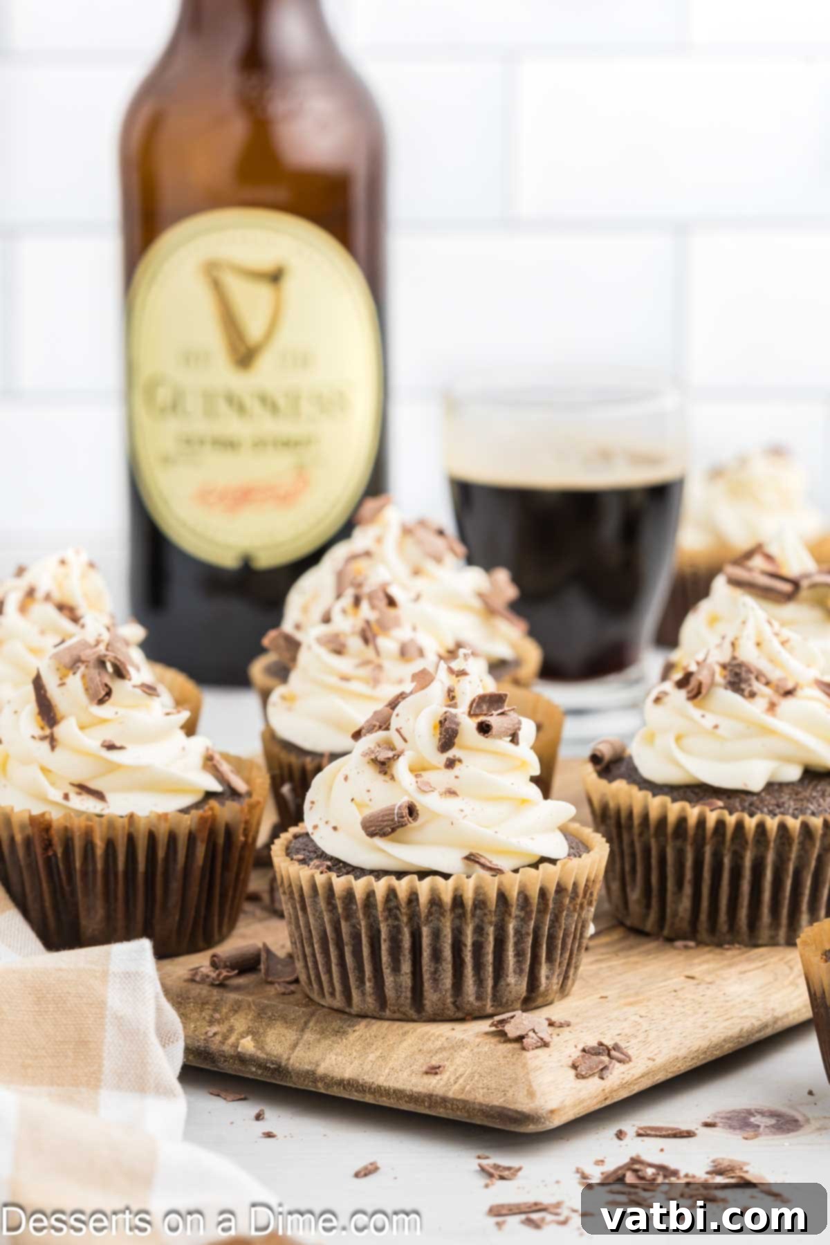 Velvet Stout Cupcakes 2 Guinness Cupcakes arranged together on a wooden tray.