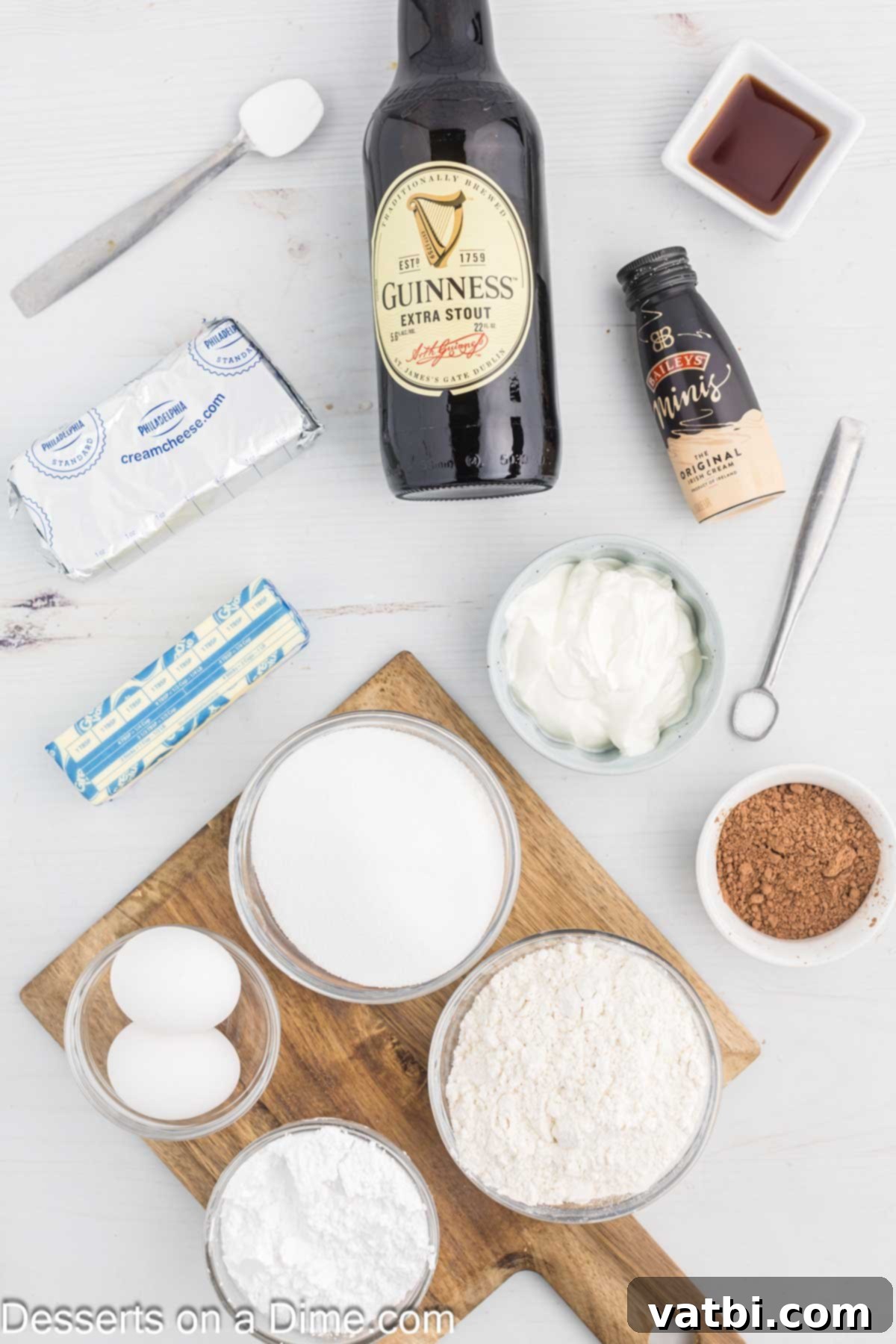Velvet Stout Cupcakes 3 Ingredients for Guinness Cupcakes - flour, baking soda, butter, eggs, vanilla, sour cream, Guinness beer, cream cheese, powdered sugar, Bailey's Irish cream, chocolate shavings.