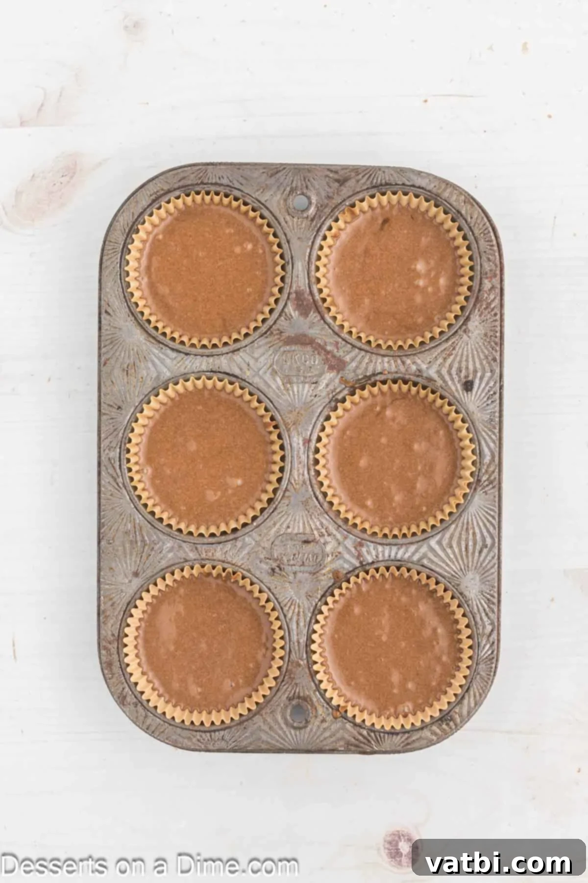 Velvet Stout Cupcakes 7 Batter poured into muffin tins.