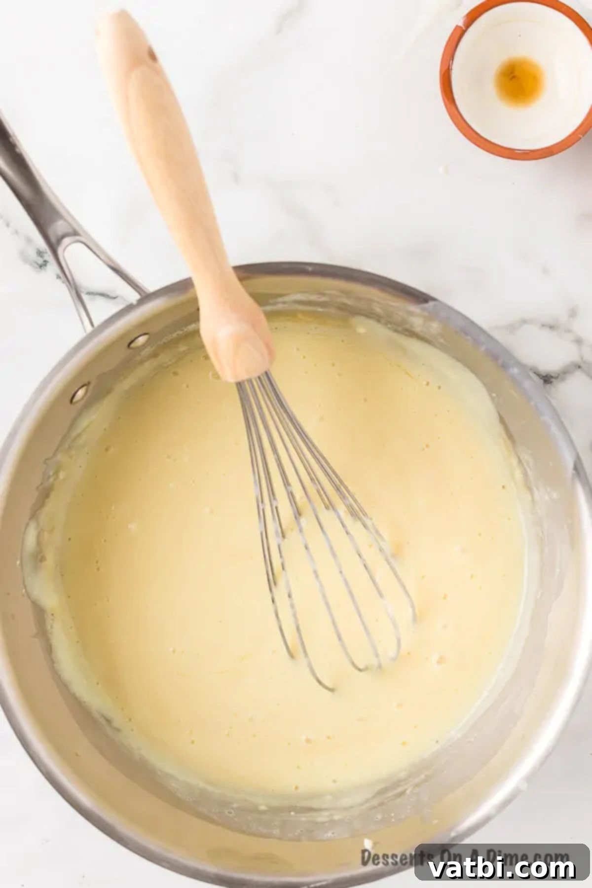 Creamy Homemade Vanilla Pudding 11 Mixture combined in pan.