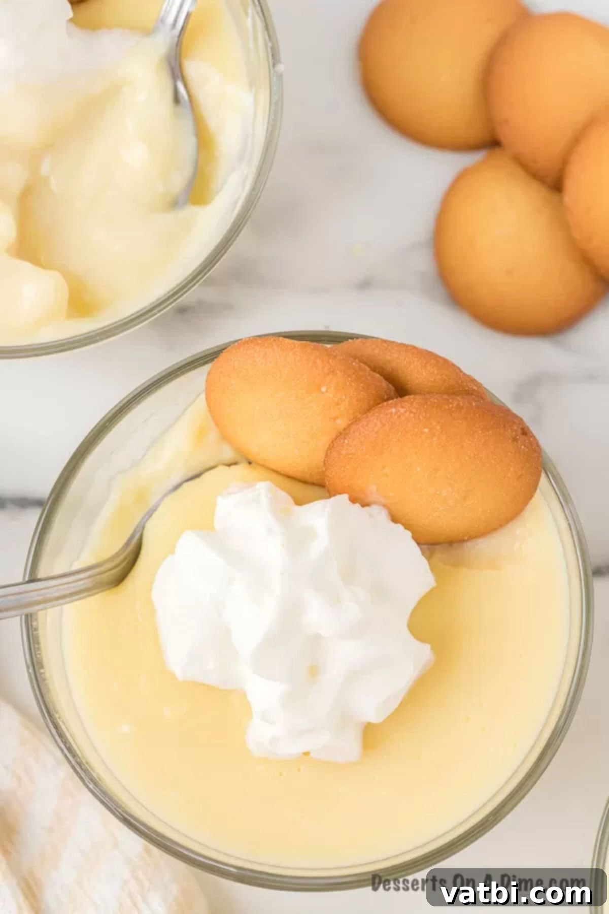 Creamy Homemade Vanilla Pudding 13 Pudding served in cups and topped with whipped cream.