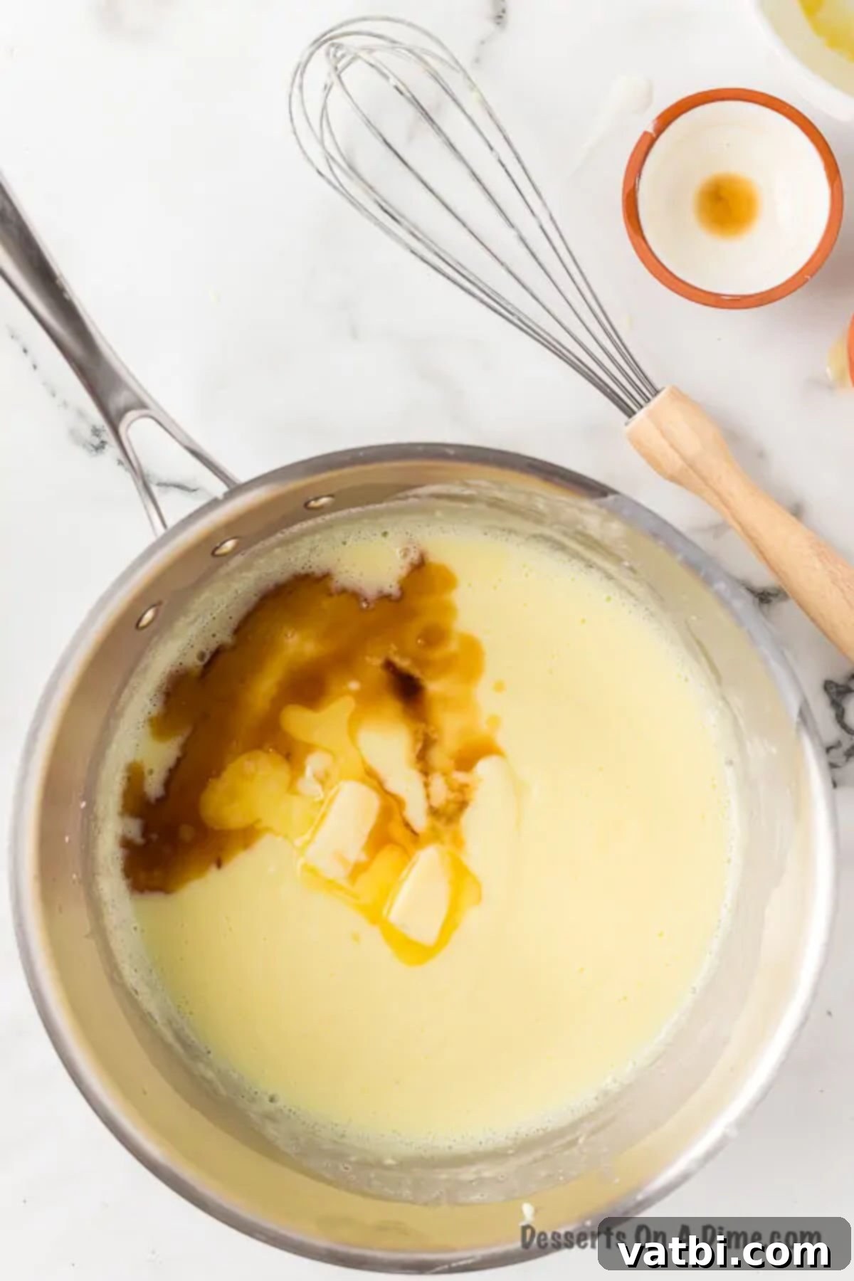 Creamy Homemade Vanilla Pudding 10 Butter and vanilla added to pan.
