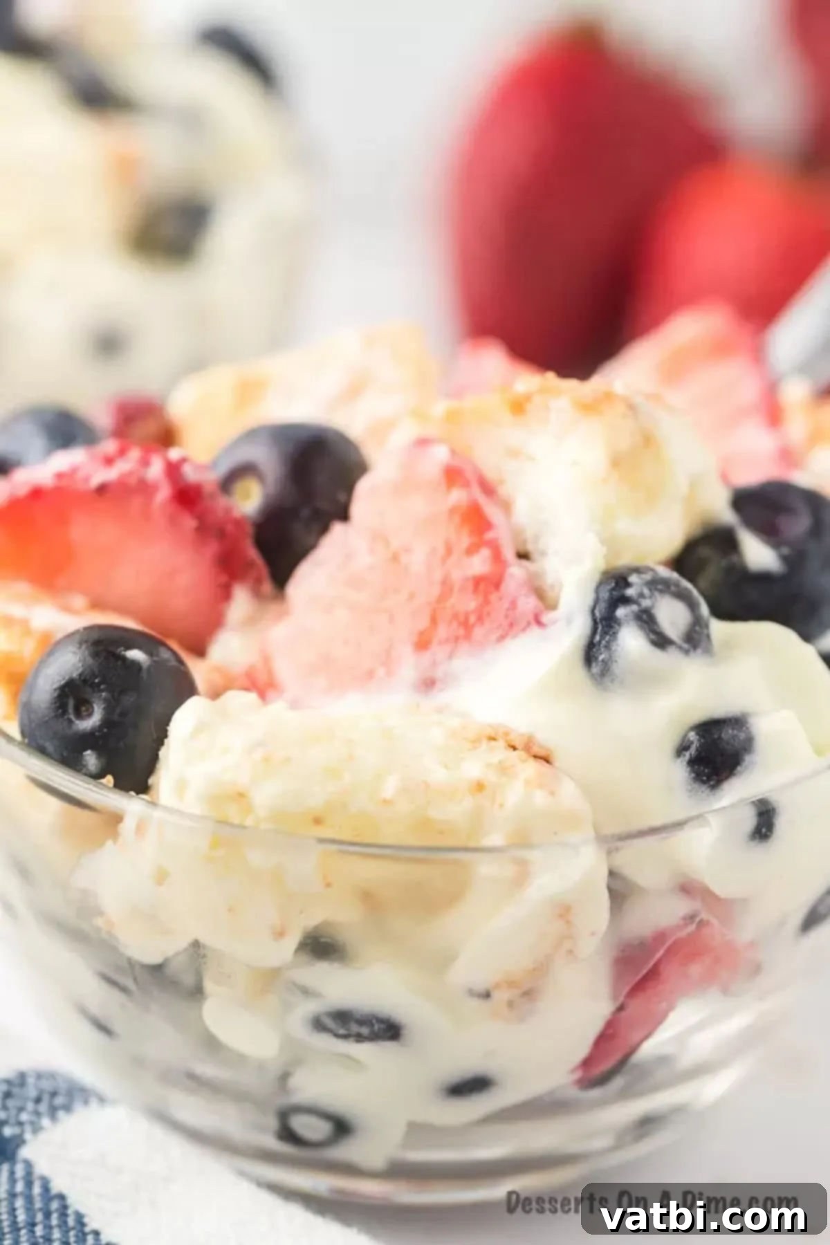 Patriotic Trifle 12 A small individual serving of Red, White, and Blue Trifle in a glass bowl, showcasing its festive layers.