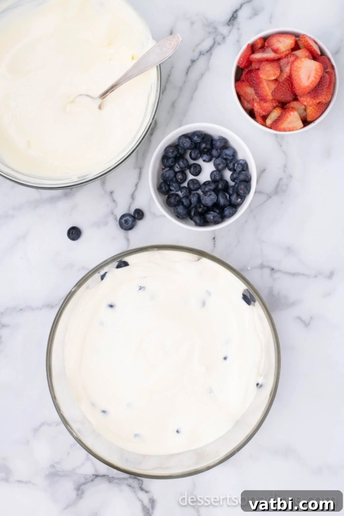 Patriotic Trifle 9 A layer of creamy pudding mixture spread over the cake in a trifle dish.