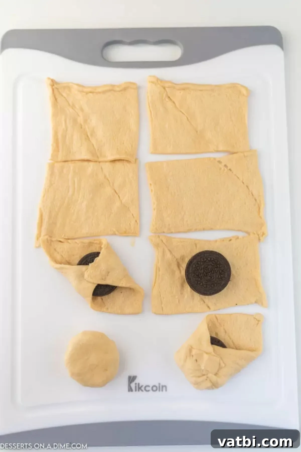 Decadent Air Fryer Oreos 4 Crescents laid out and topped with oreo cookies.
