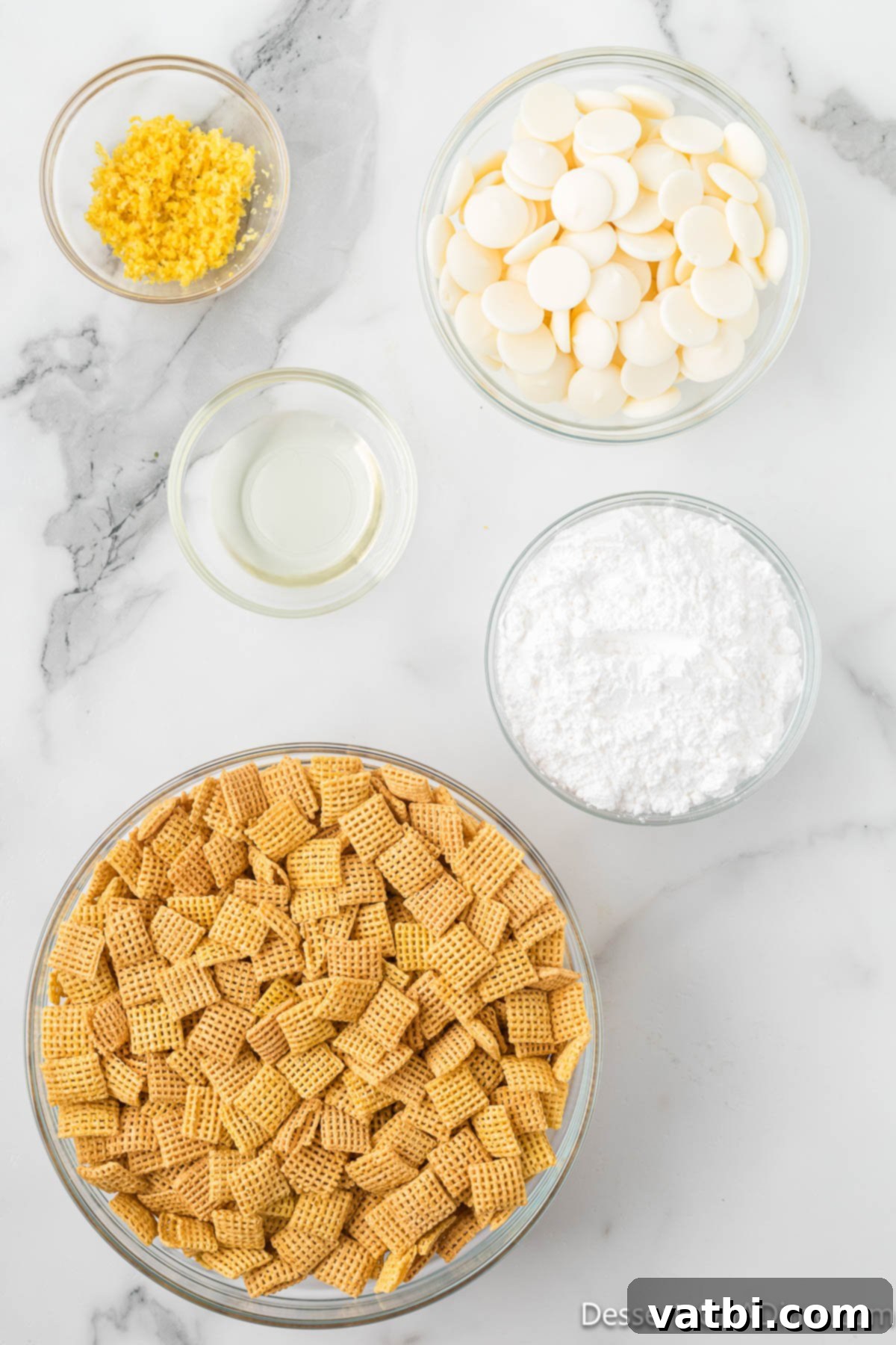 Ingredients for recipe - chex cereal, melting chocolate, lemon zest, powdered sugar, oil. 