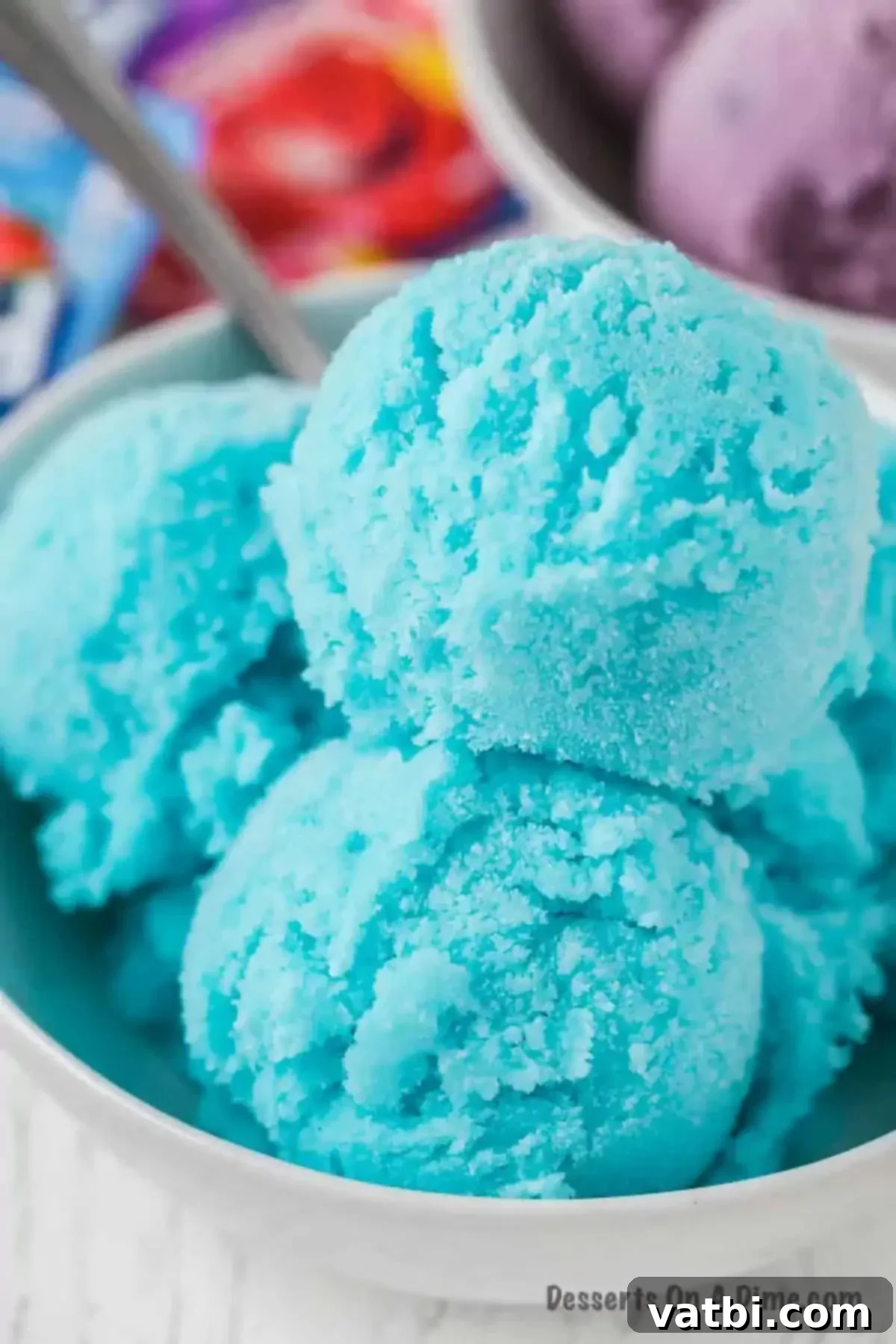 No-Churn Kool-Aid Ice Cream Magic 2 Blue Kool Aid Ice Cream in a white bowl