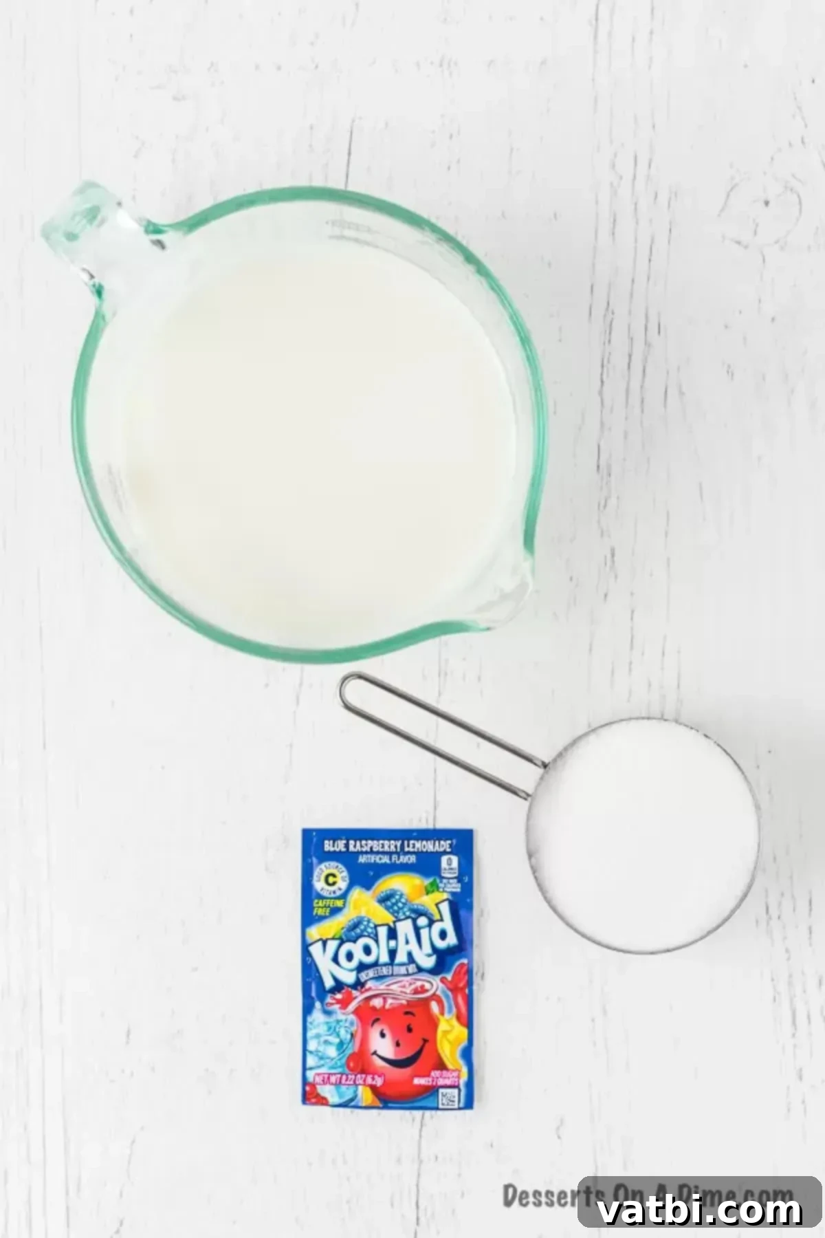 No-Churn Kool-Aid Ice Cream Magic 3 Ingredients to make Kool Aid Ice Cream - kool aid, milk, sugar.