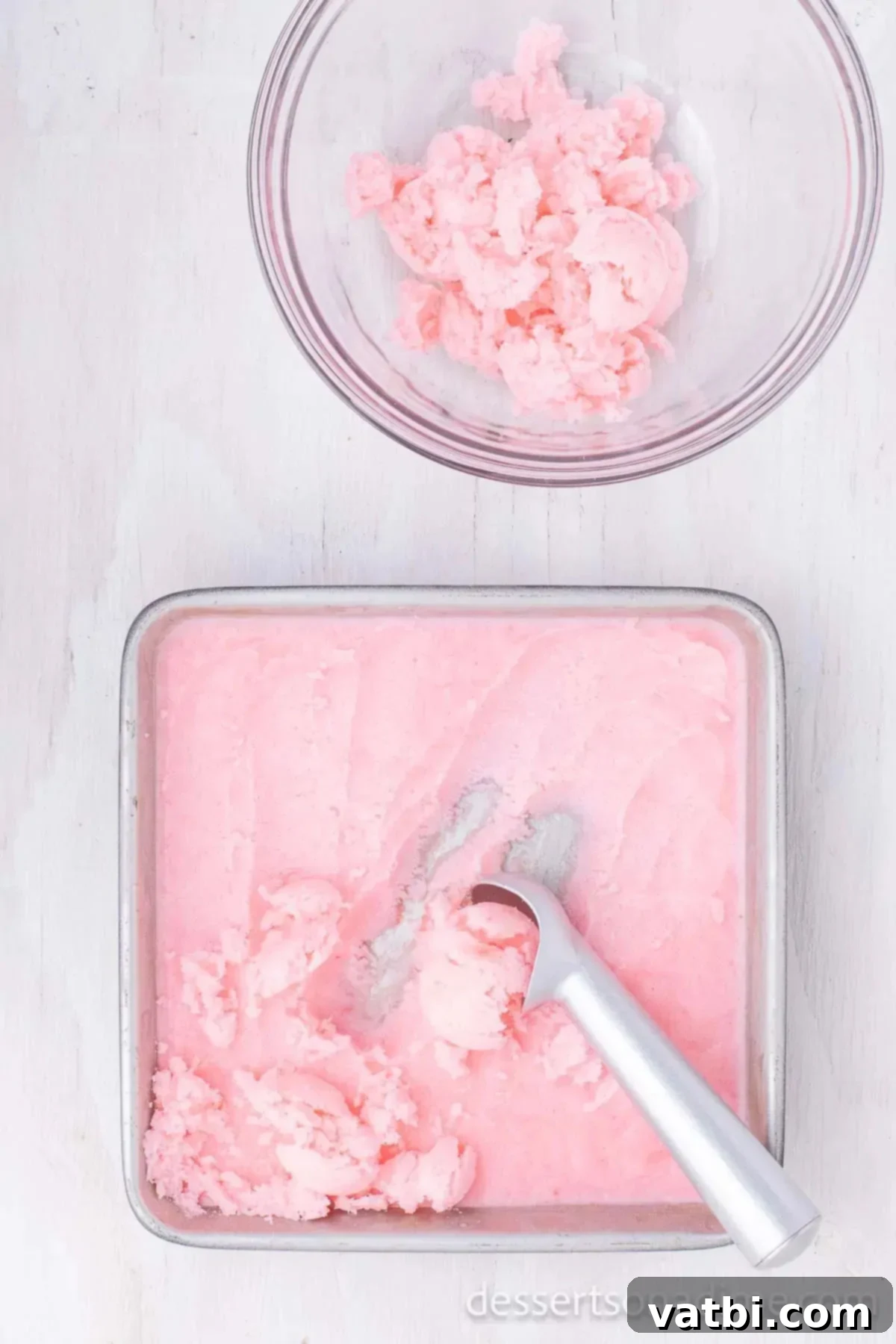 No-Churn Kool-Aid Ice Cream Magic 7 Ice Cream mixture in shallow cake pan.