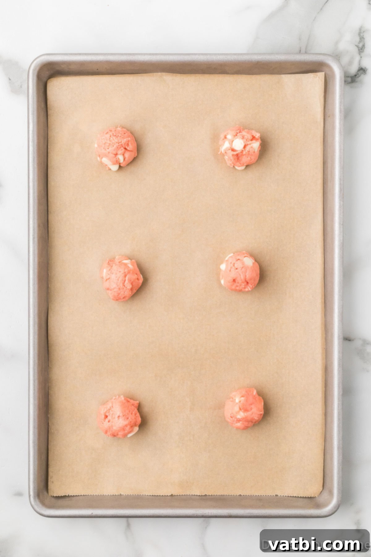 Cake Mix Love Bites 6 Cookie dough on baking sheet.