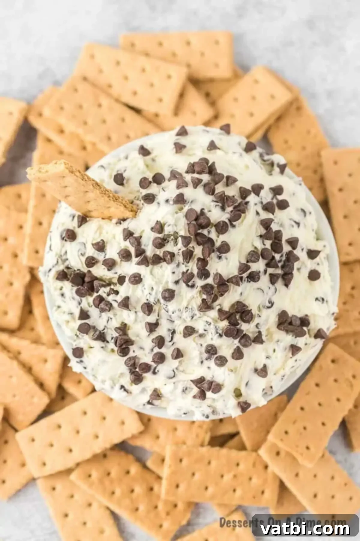Divine Decadence Dip 8 Serving bowl with dip and graham crackers beside it.