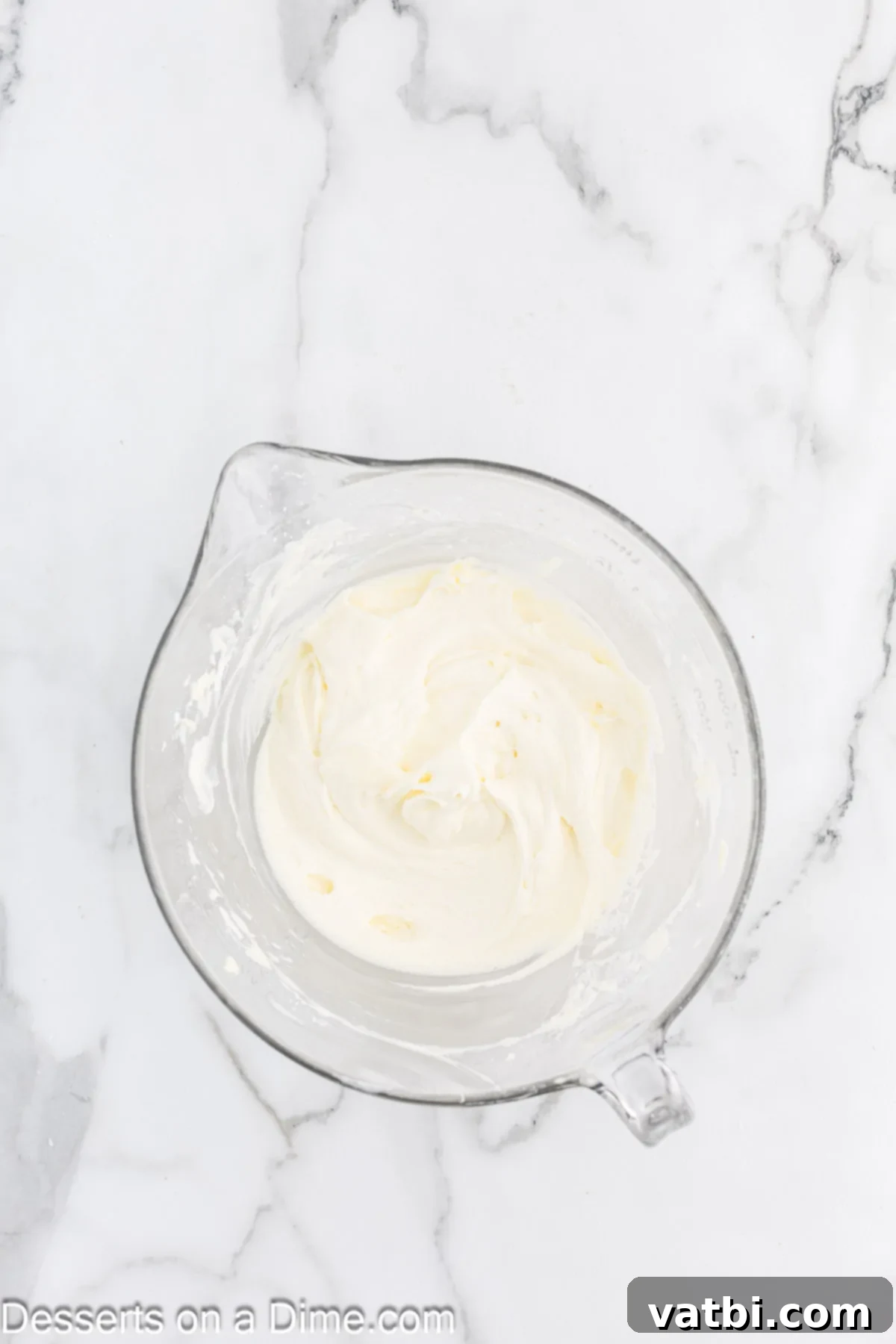 Paula Deen's Signature Pumpkin Bars 11 Cream cheese mixture combined together with vanilla to make the frosting.