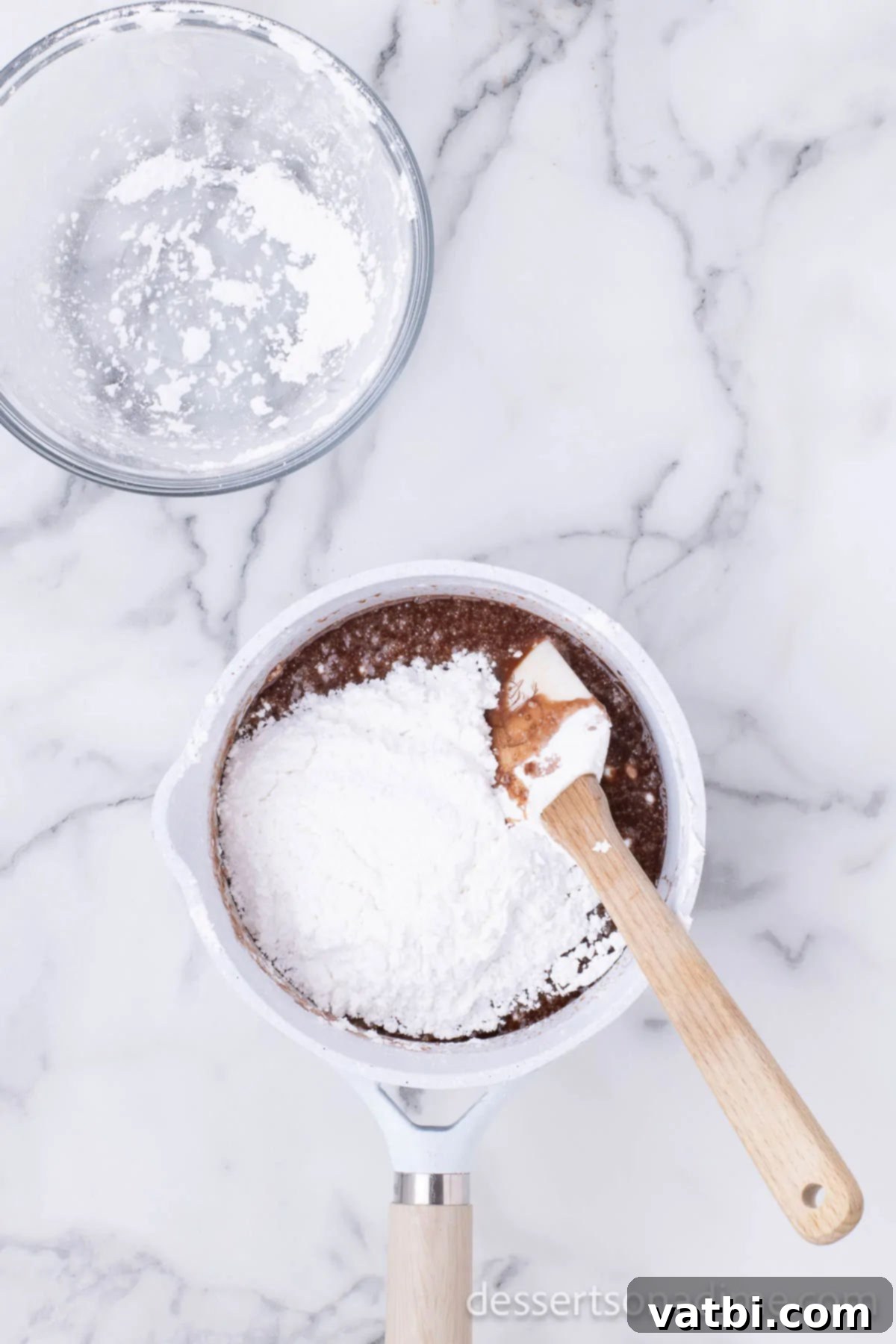 Dark Dr Pepper Decadence 7 Powdered Sugar added to mixture after removed from heat.
