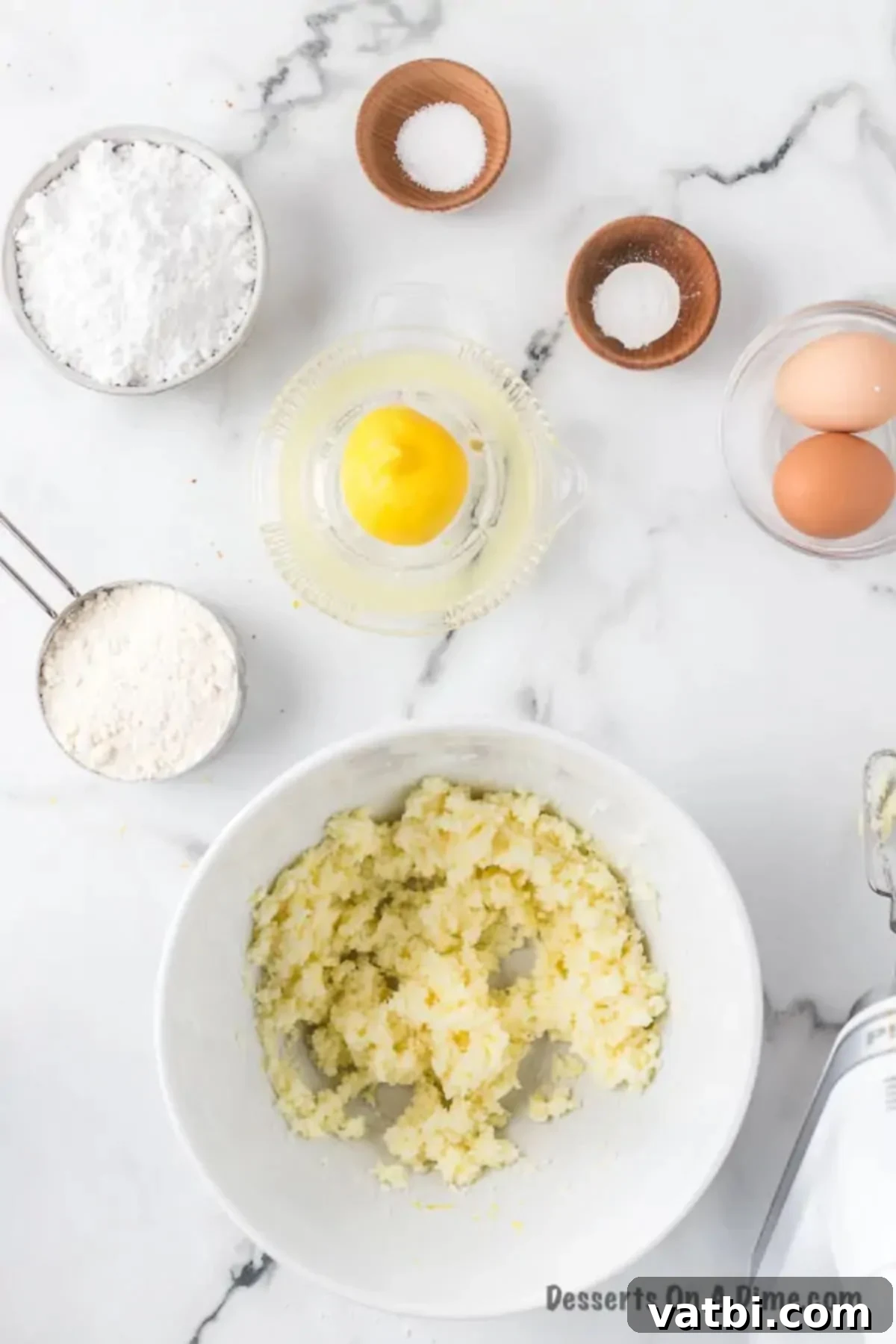 Zesty Lemon Brownie Bliss 4 Mixing bowl with softened butter, sugar, and lemon zest.