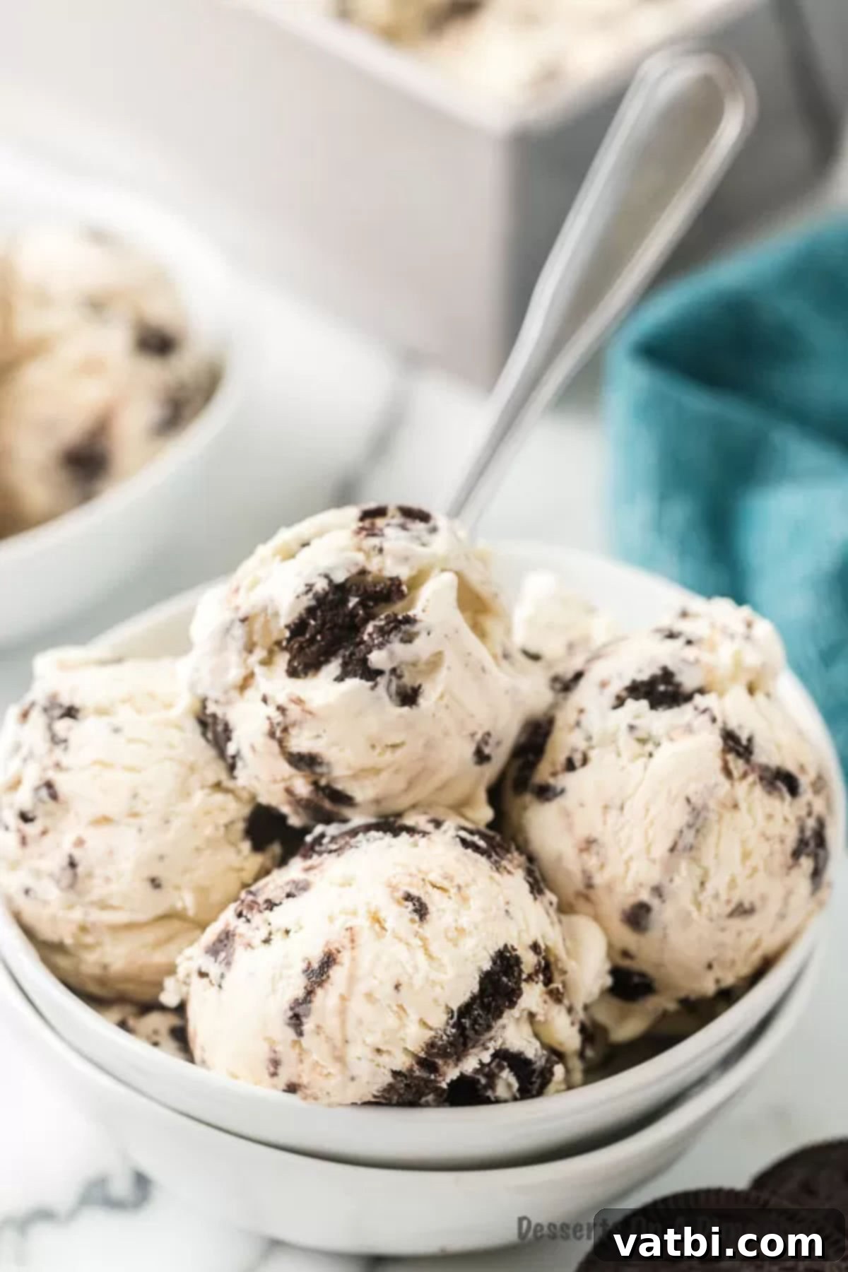 Swirled Cookie Bliss 10 A bowl of creamy cookies and cream ice cream, perfectly scooped and ready to be served and enjoyed.
