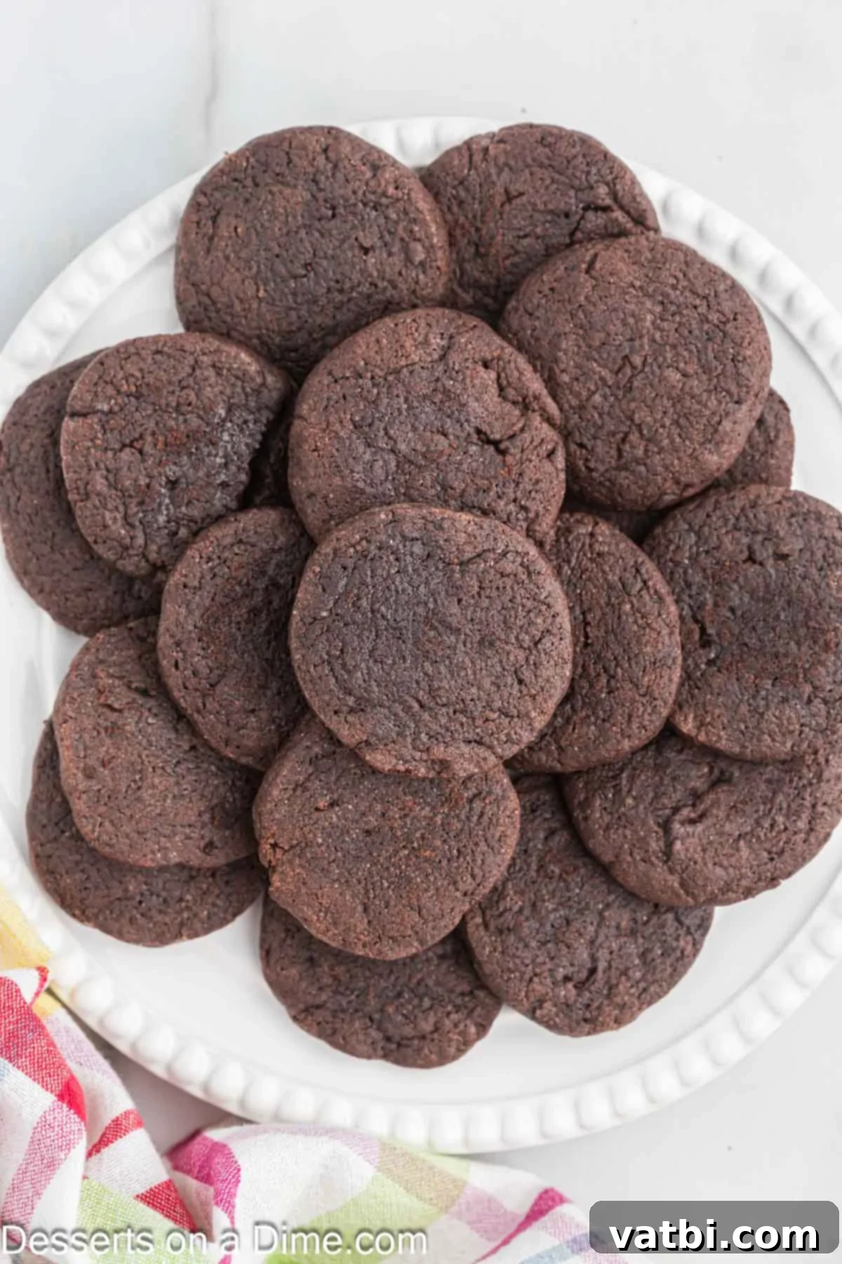 Layered Chocolate Delights 12 A beautiful display of baked chocolate wafer cookies on a rustic serving platter, ready to be enjoyed.