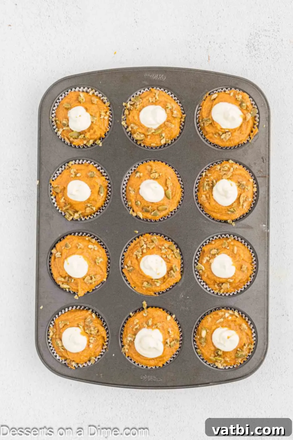 Starbucks Autumn Pumpkin Cream Cheese Muffins 12 Pumpkin seeds sprinkled on top of each muffin.