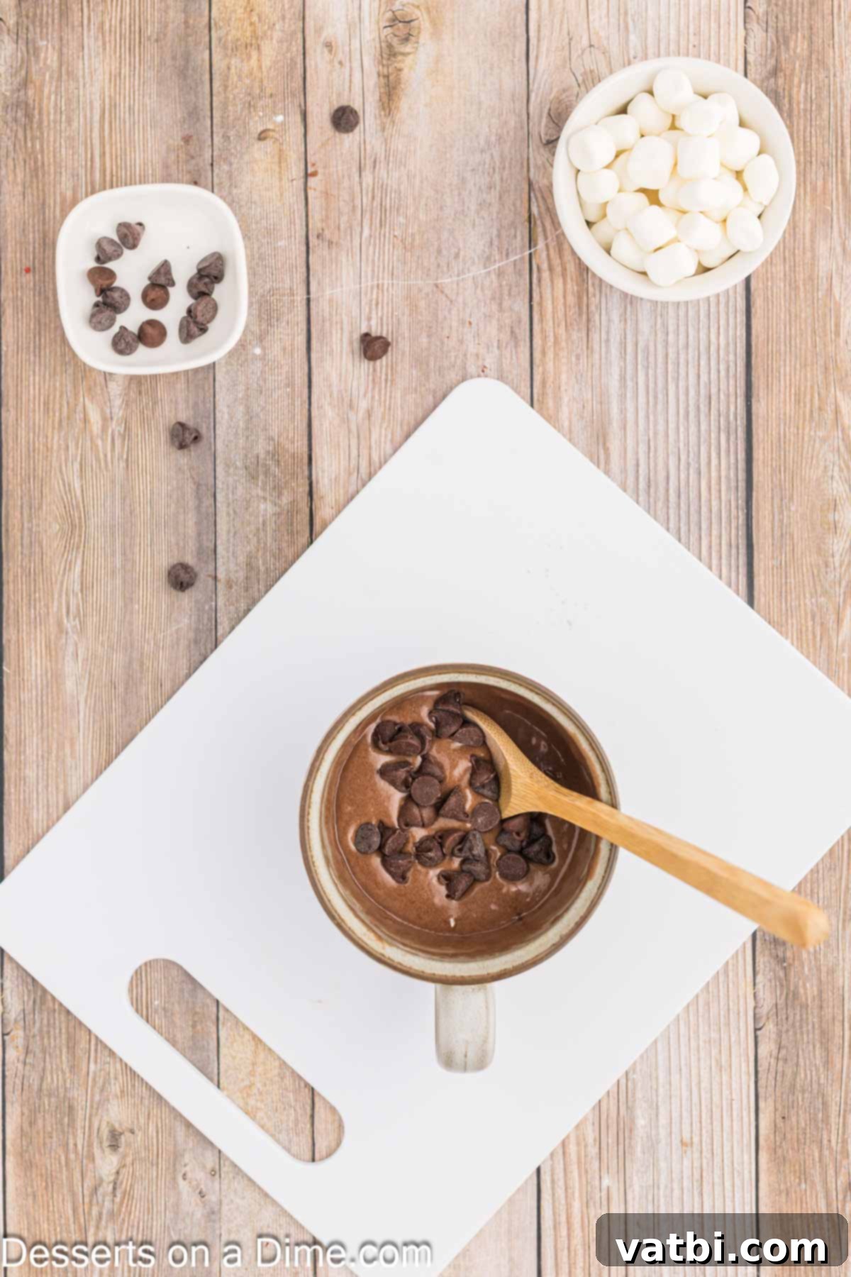 Decadent Hot Chocolate Mug Cake 5 Chocolate chips folded into mug.