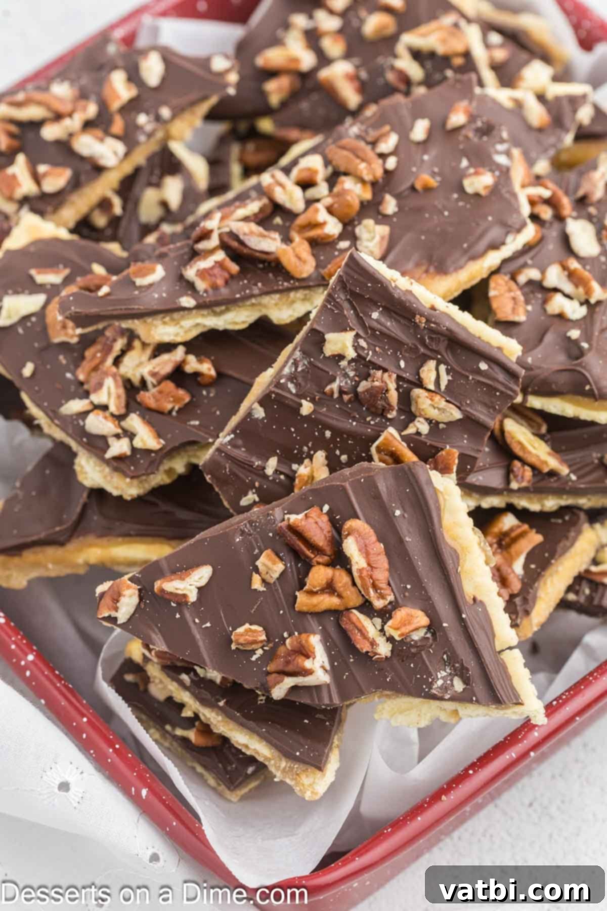 Saltine Toffee broken into pieces, showcasing the chocolate and caramel layers.