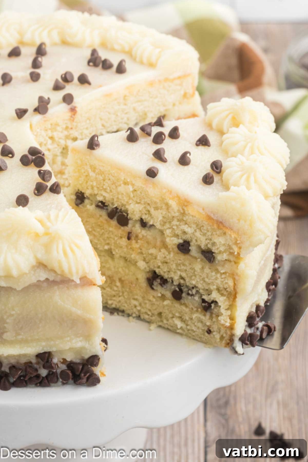 Italian Ricotta Dream Cake 11 A perfectly sliced piece of Cannoli Cake, revealing the moist layers and rich frosting, ready to be enjoyed.