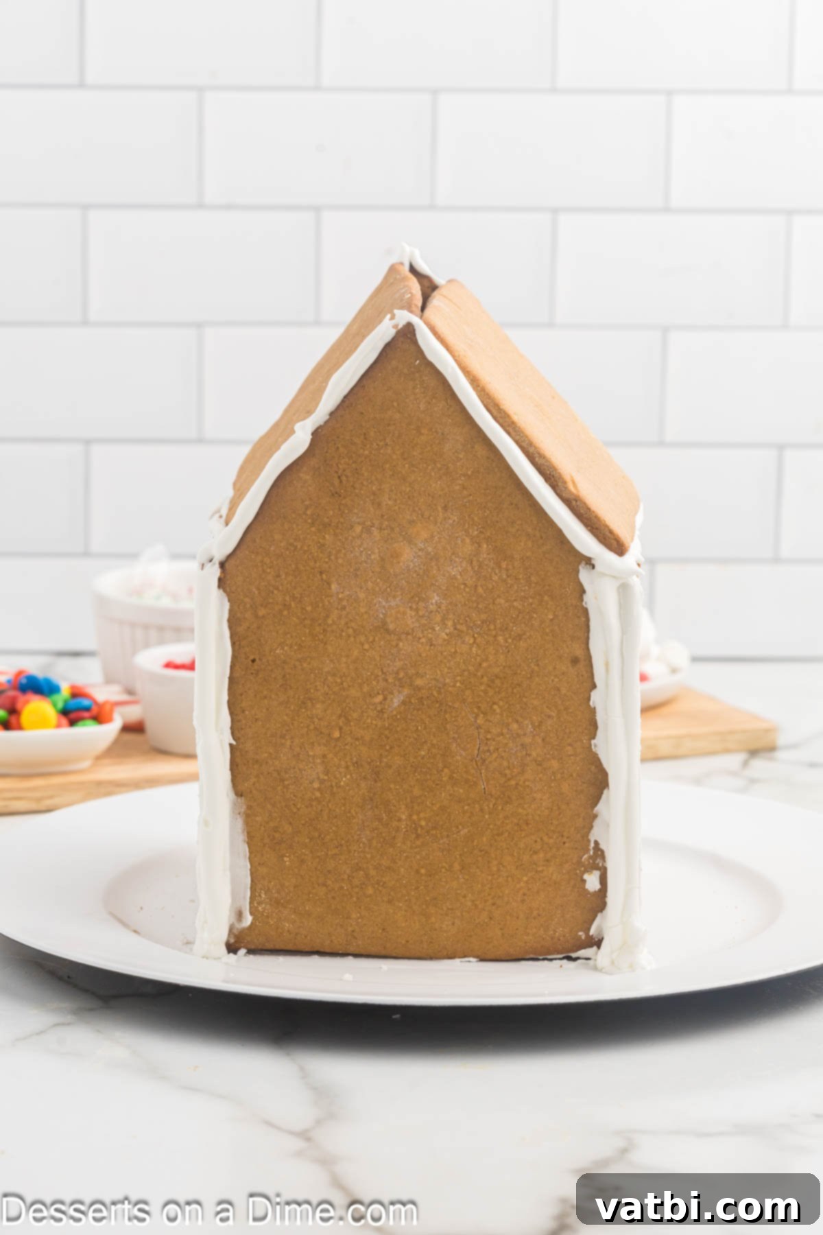 Gingerbread house on a platter. 