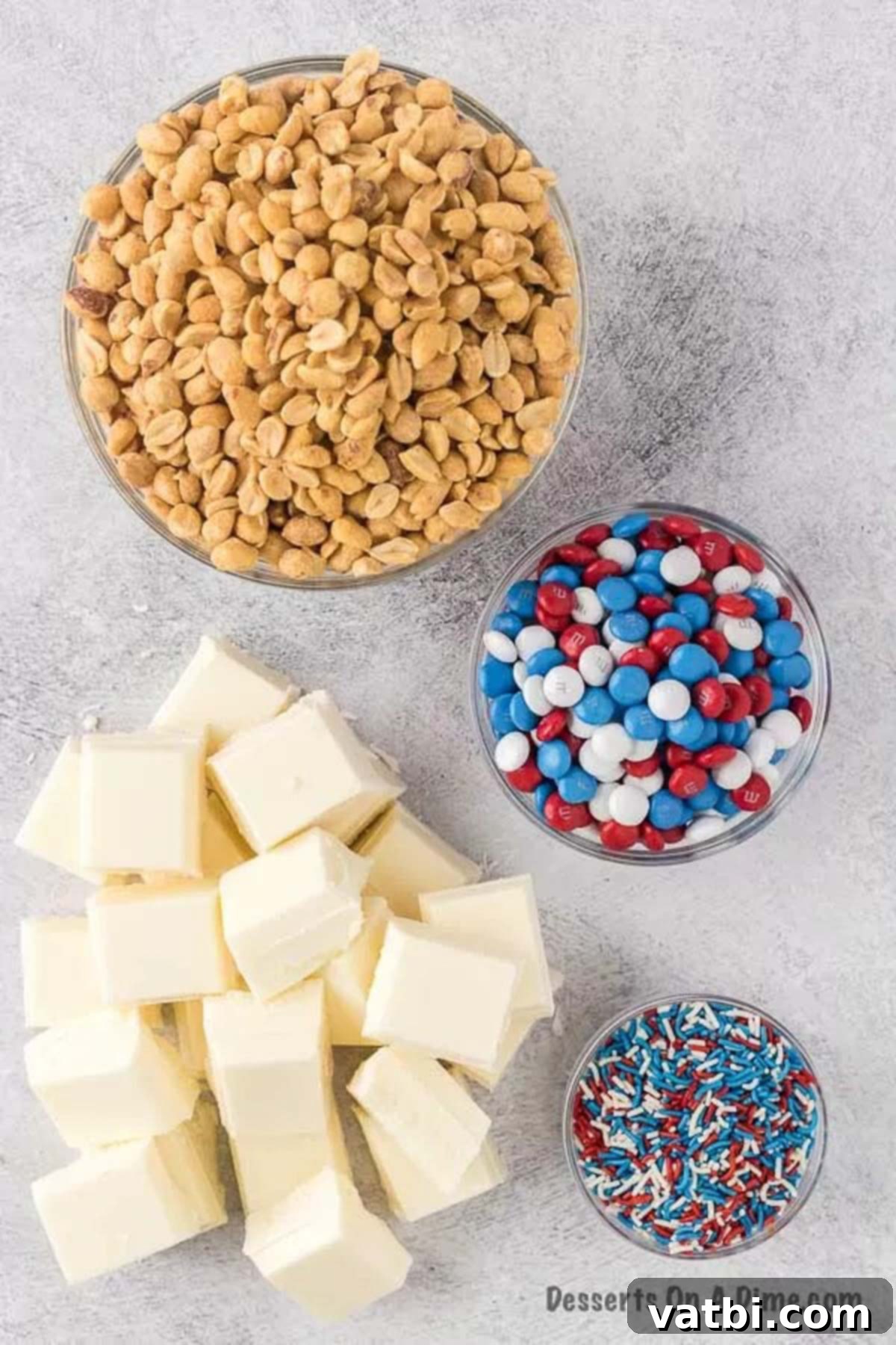 One-Pot Patriotic Peanut Clusters 3 Ingredients needed to make crock pot Patriotic Clusters - peanuts, white almond bark, m&ms, sprinkles.