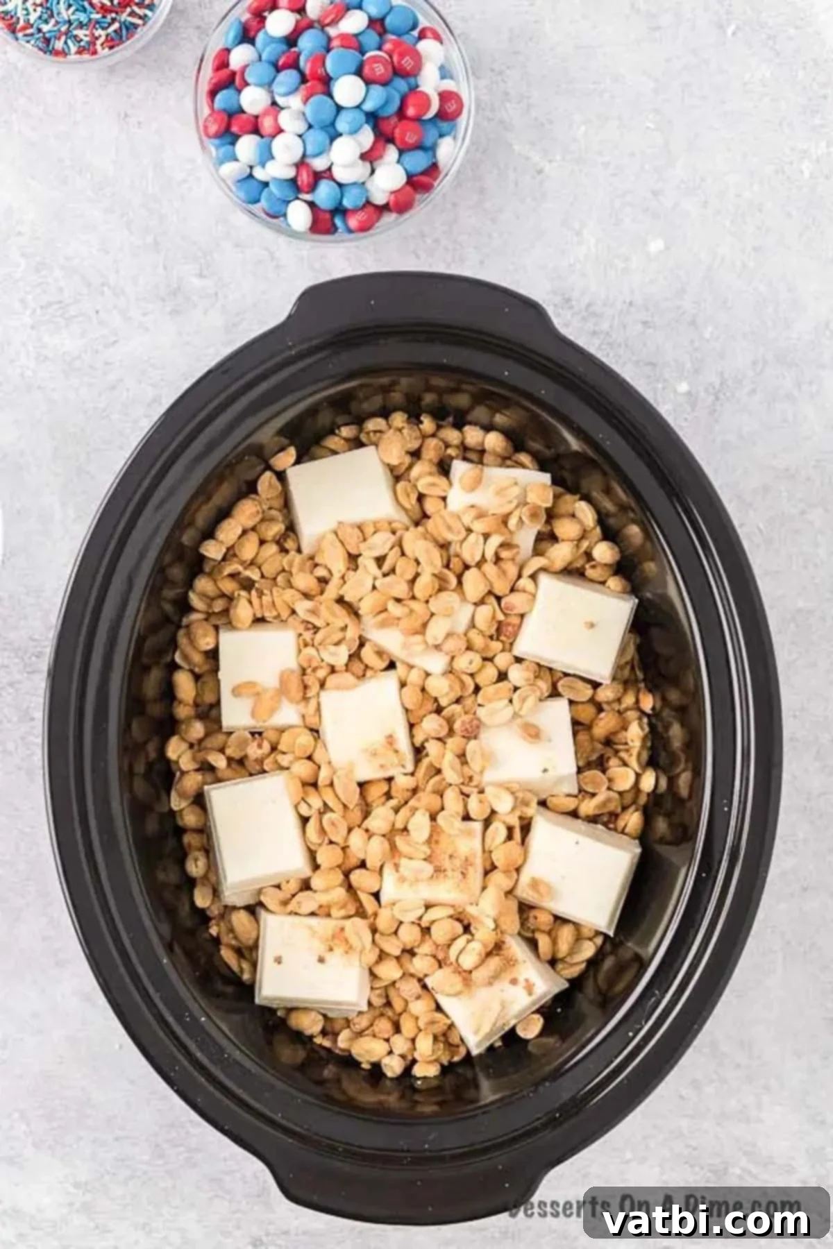 One-Pot Patriotic Peanut Clusters 4 Crock Pot of peanuts and almond bark.