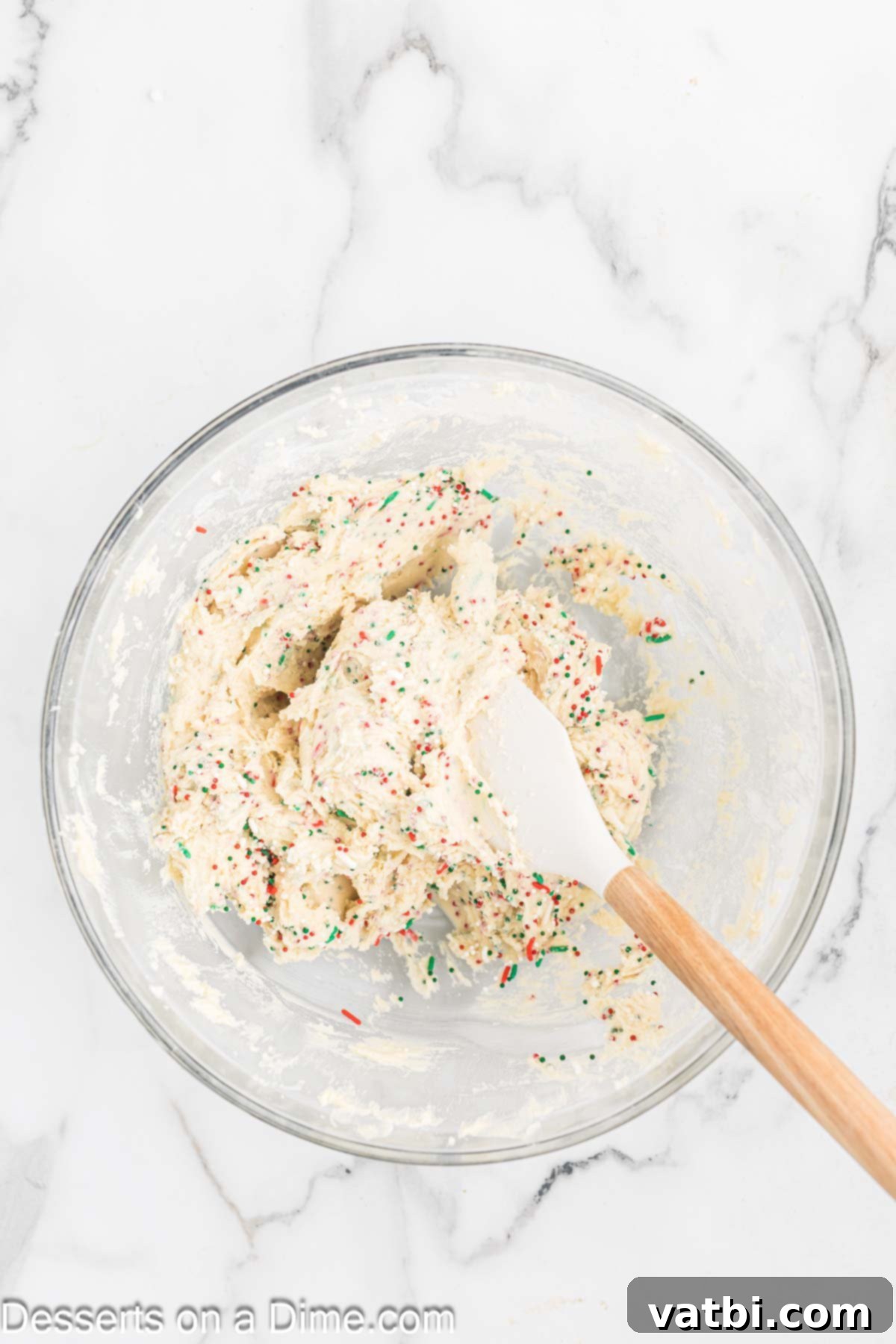 Yuletide Shortbread Delights 6 Colorful Christmas sprinkles gently folded into the shortbread dough mixture.
