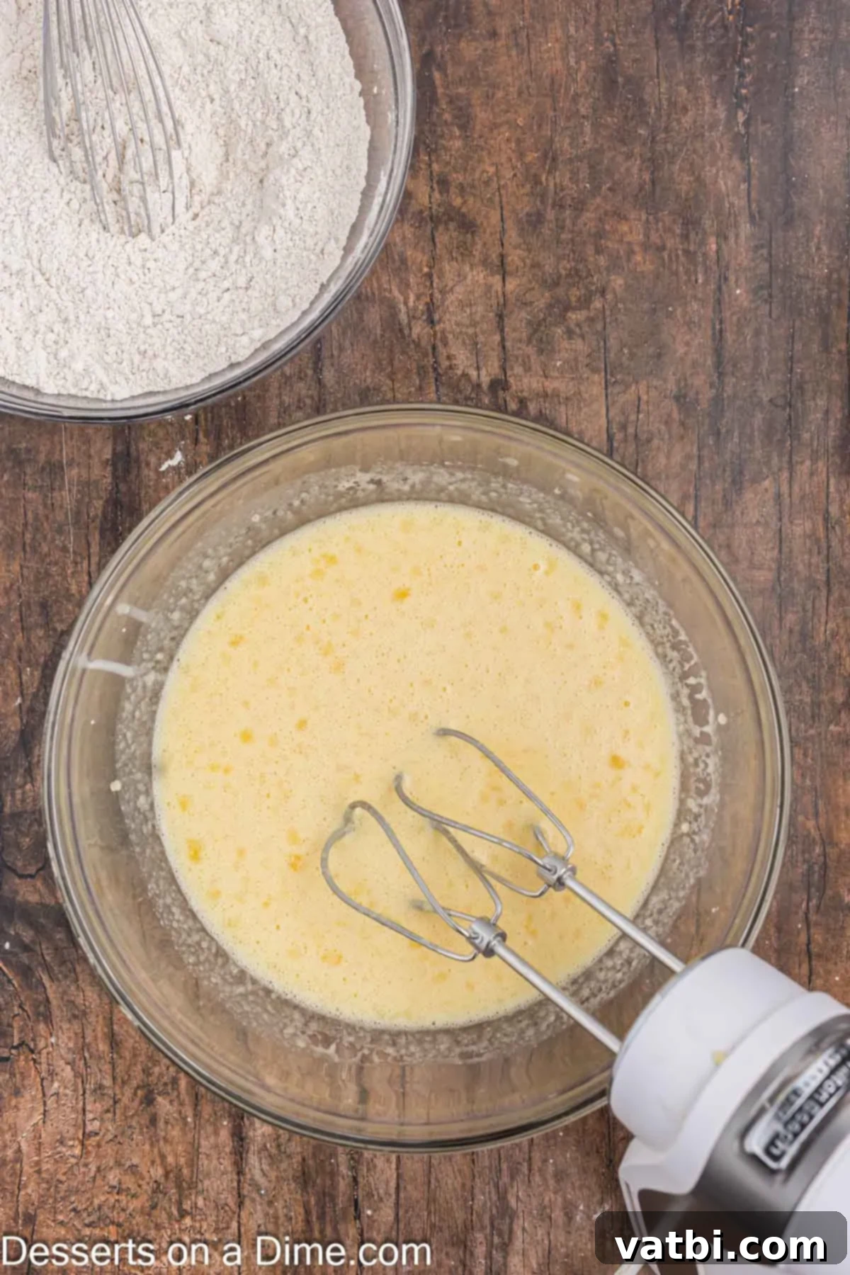 Easy Eggnog Bread 4 Wet ingredients combined in a bowl.