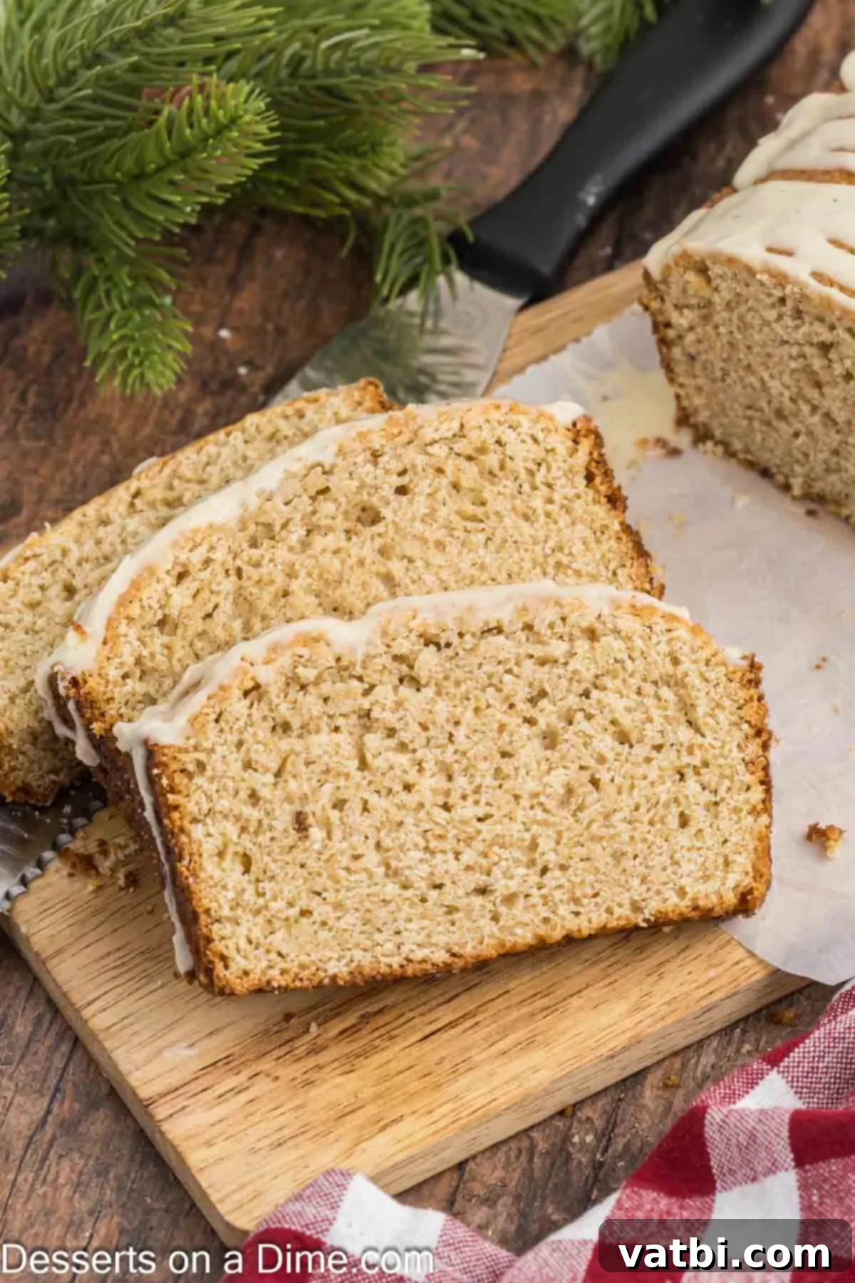 Easy Eggnog Bread 9 Eggnog Bread sliced on a cutting board.