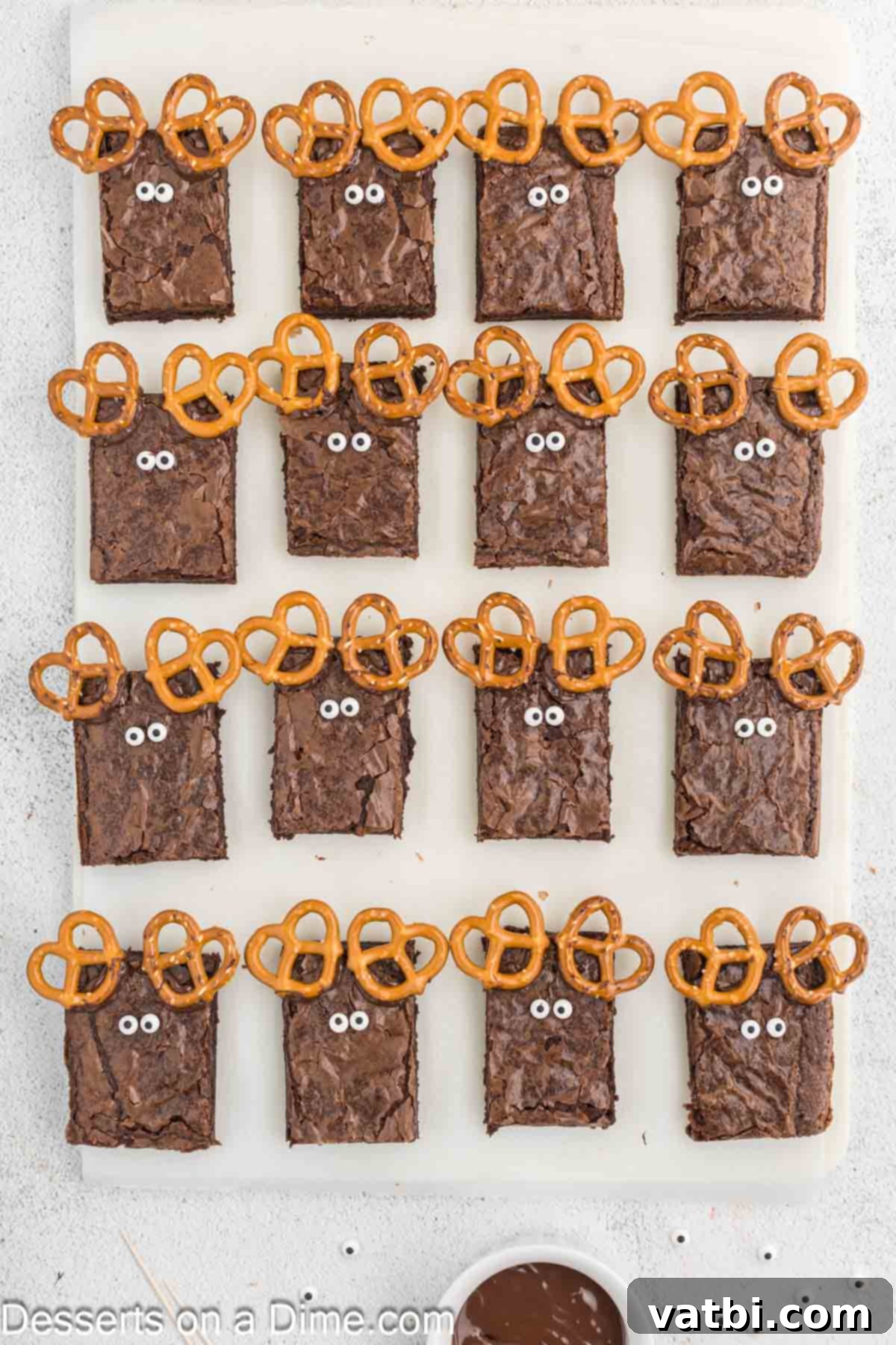Reindeer Brownies 6 Candy eyes are carefully placed onto each brownie, using melted chocolate as adhesive.