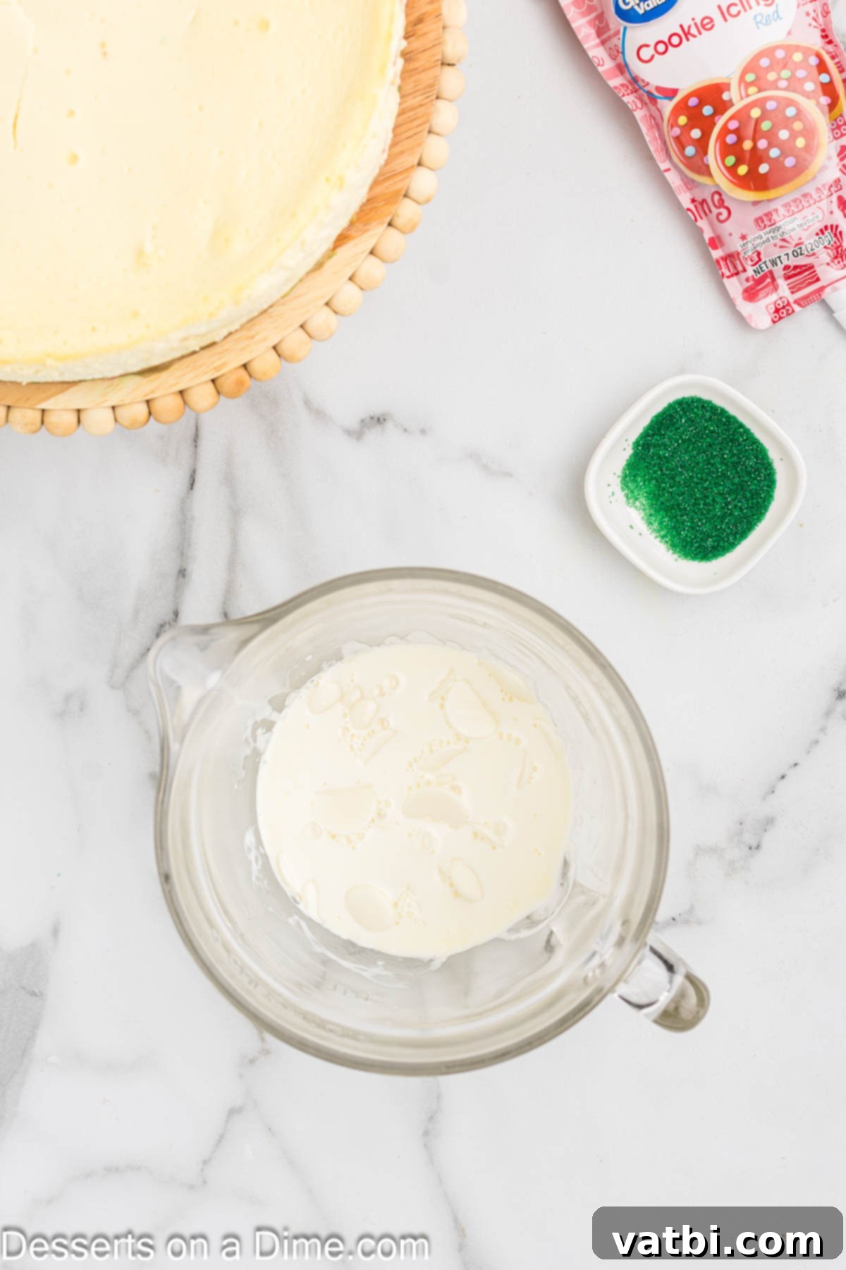 Little Debbie Christmas Tree Cheesecake: A Festive Indulgence 14 White chocolate chunks and heavy cream combined in a bowl, ready to be stirred into ganache.