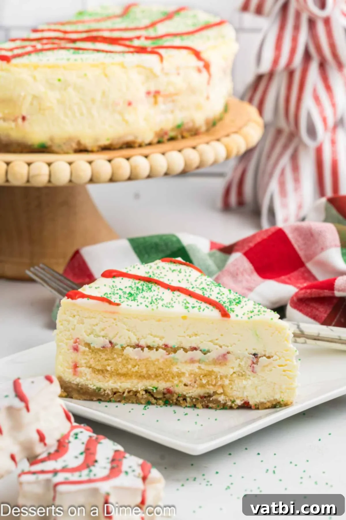 Little Debbie Christmas Tree Cheesecake: A Festive Indulgence 18 A slice of Little Debbie Christmas Tree Cheesecake on a plate, showing the layers and internal Christmas tree cakes.