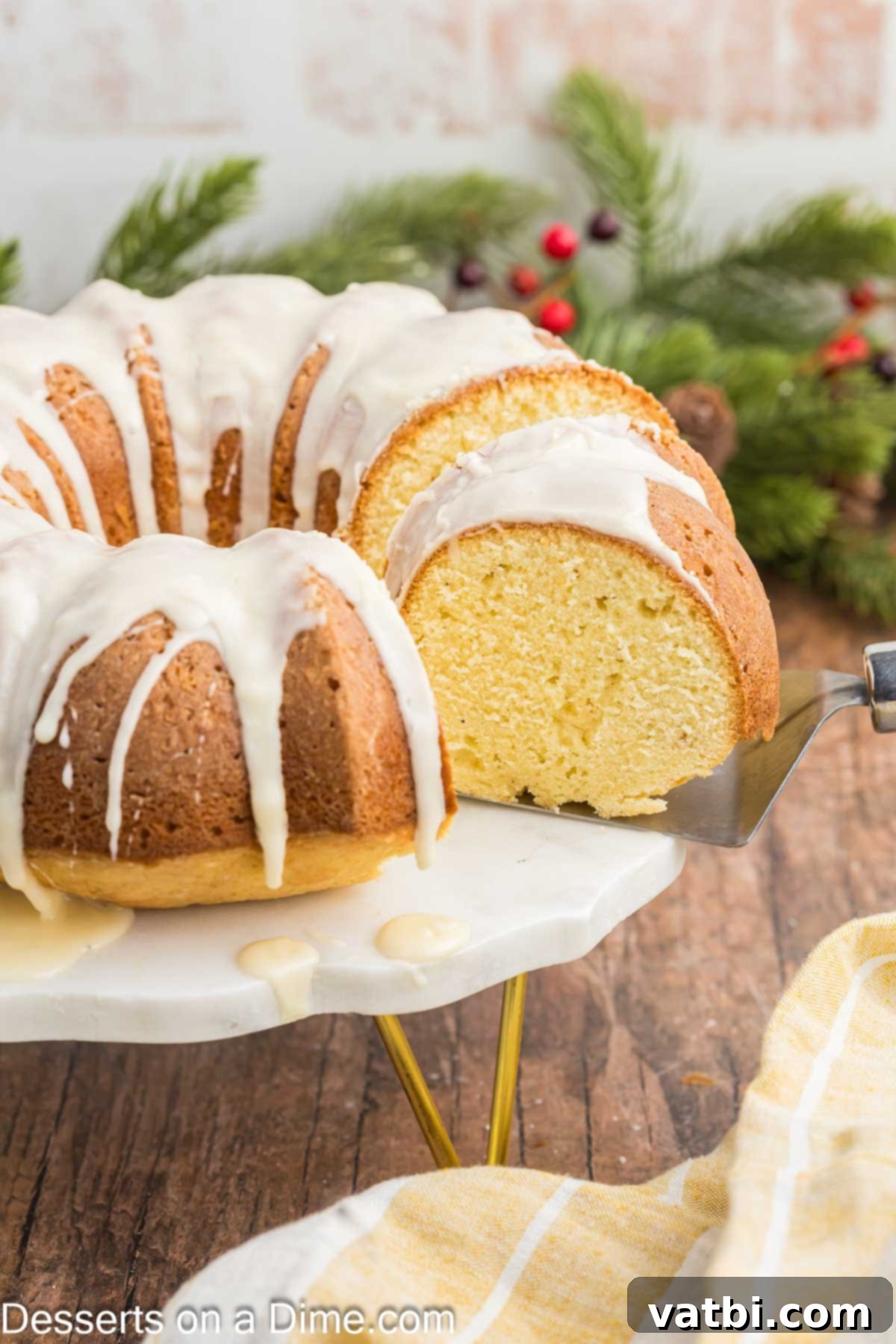 Eggnog Bundt Cake being sliced. 