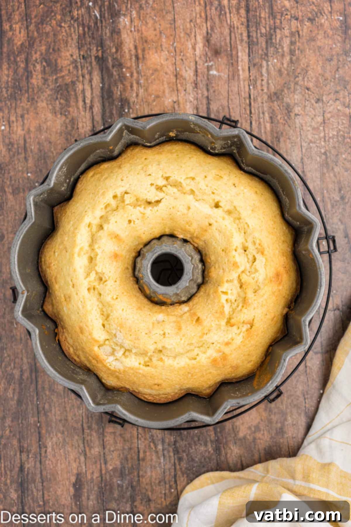 Cake baked and cooling in pan. 