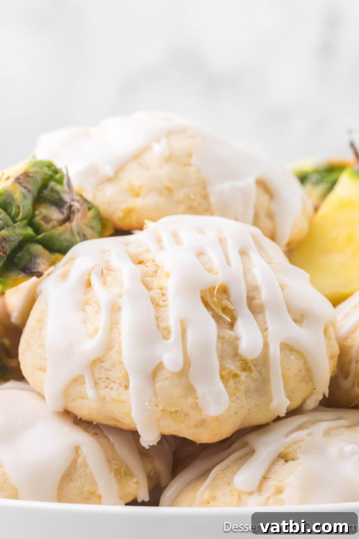 Pineapple Cookies stacked together on a plate, ready to be served and enjoyed.