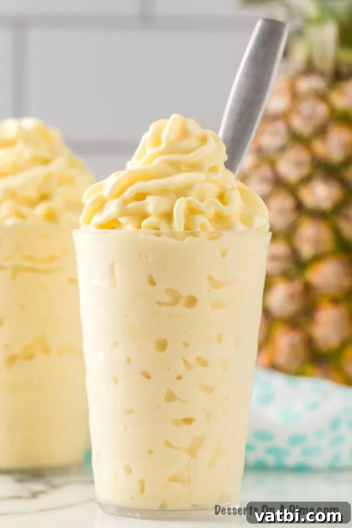 Easy Homemade Dole Whip Recipe 2 Dole Whip in a glass.