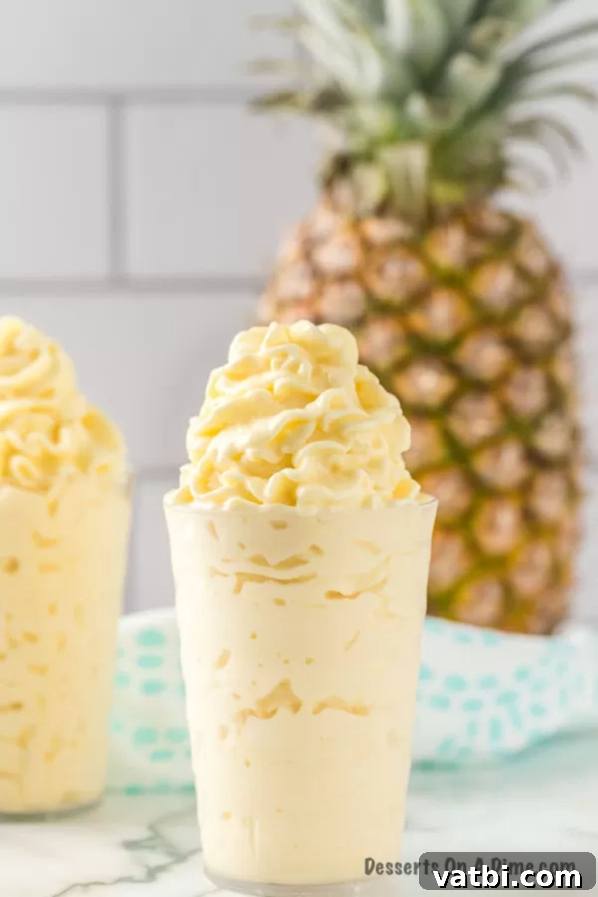 Easy Homemade Dole Whip Recipe 7 Dole whip in a glass.