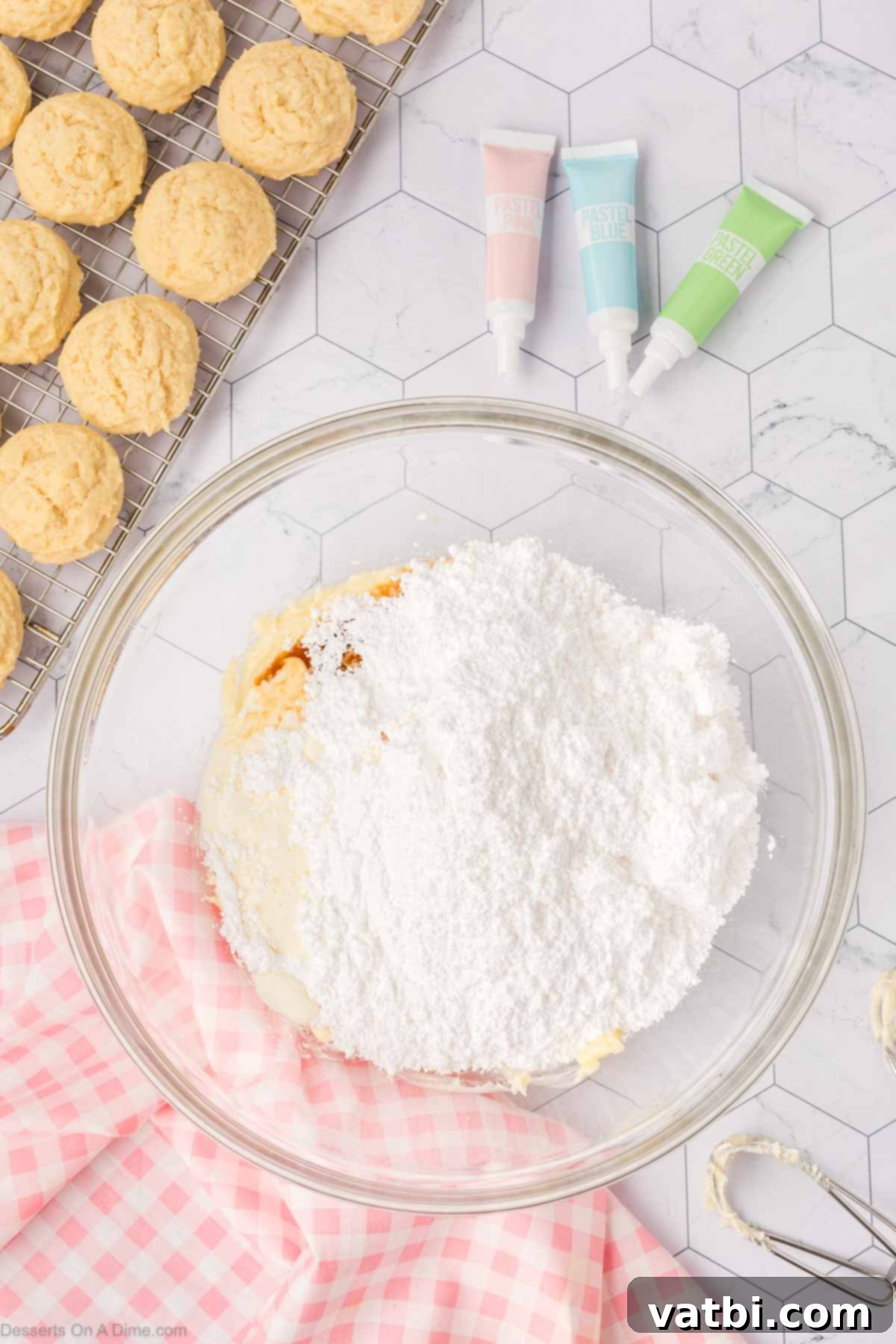 Soft Sour Cream Sugar Cookies 12 Ingredients for buttercream frosting combined in a bowl.