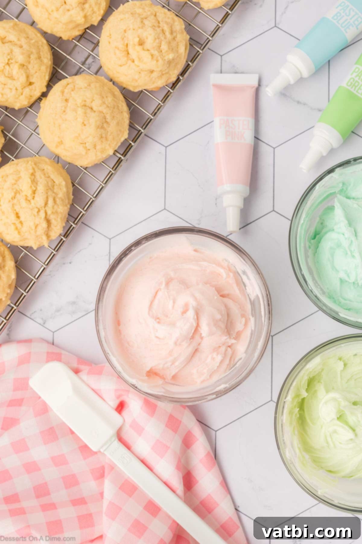 Soft Sour Cream Sugar Cookies 13 Buttercream frosting mixed with food coloring.